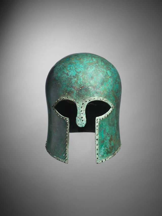 A Greek bronze Corinthian helmet