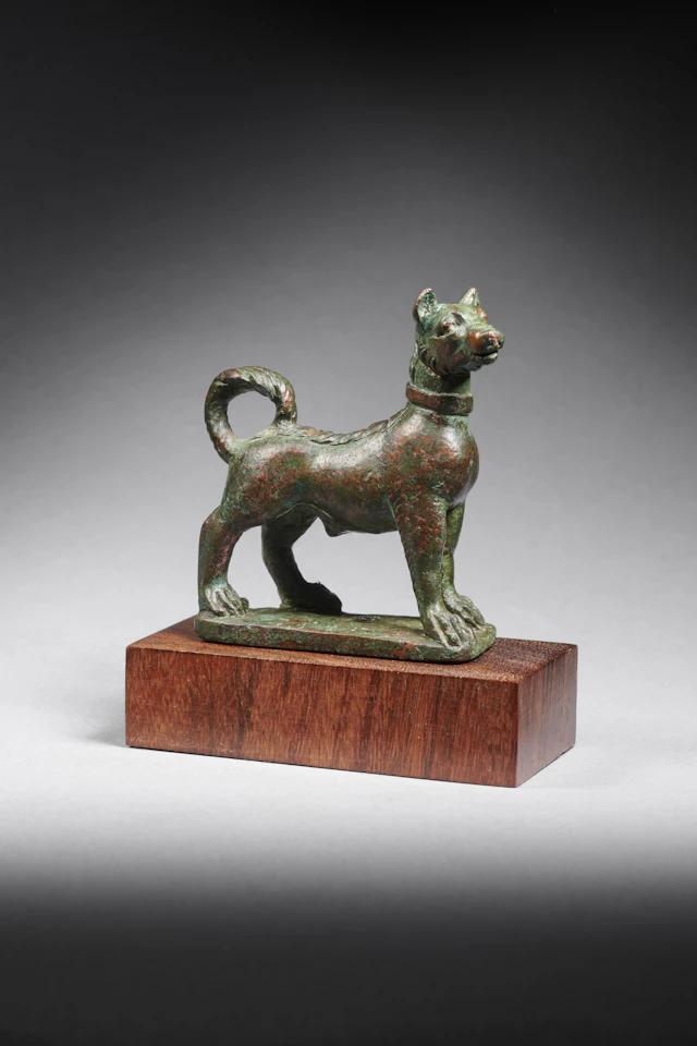A Roman bronze statuette of a female dog