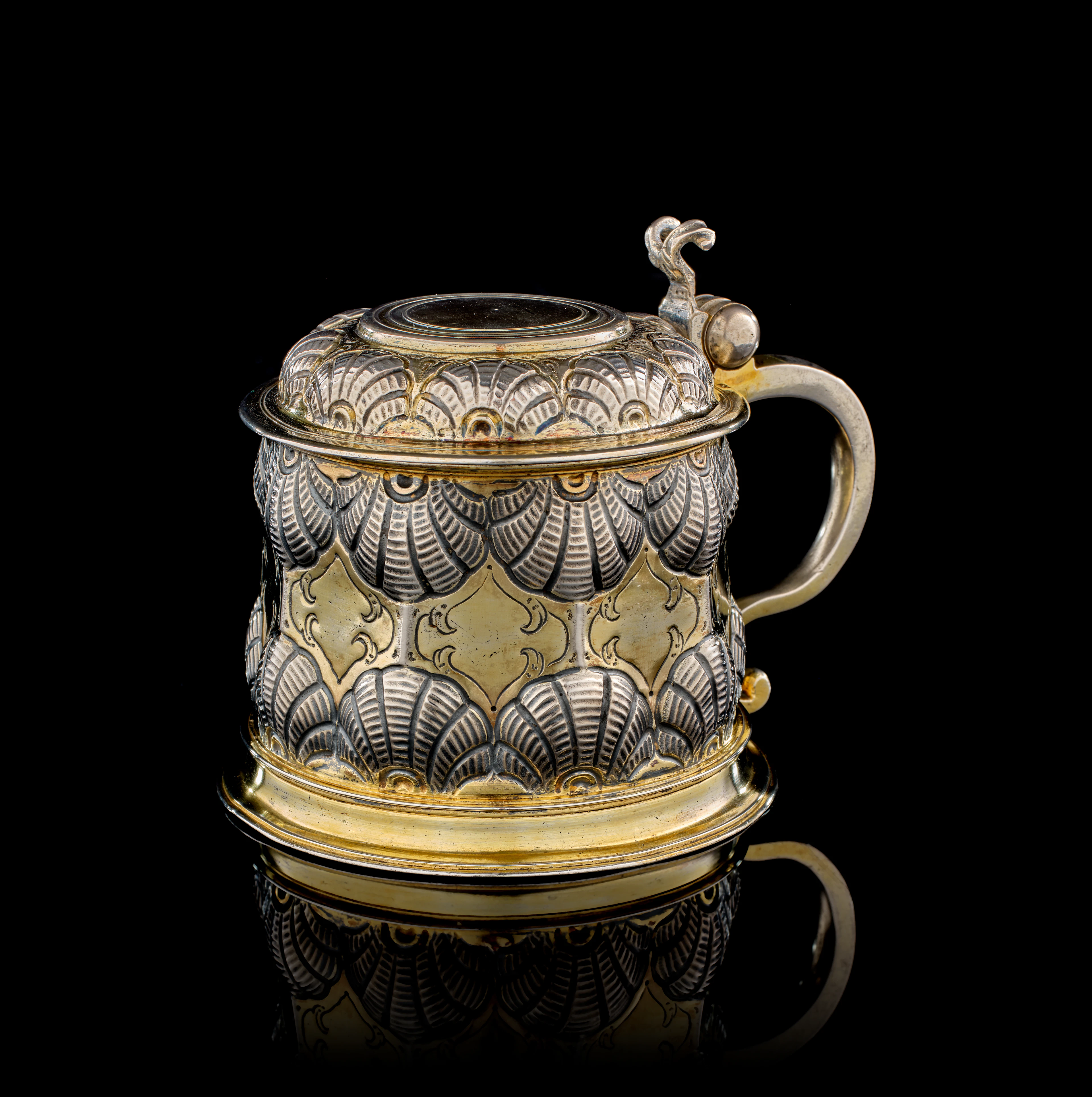 A German parcel-gilt silver covered maternity tankard, Hieronymus