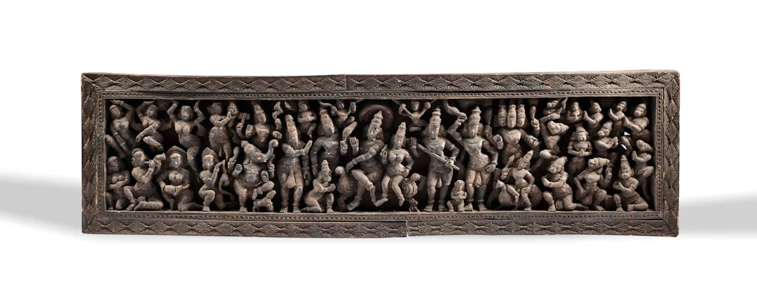 A Monumental Carved Wood Panel Depicting the Coronation of Rama