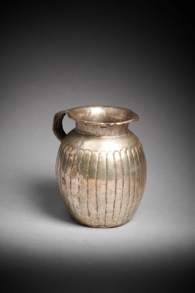 A Hellenistic parcel-gilt silver jug