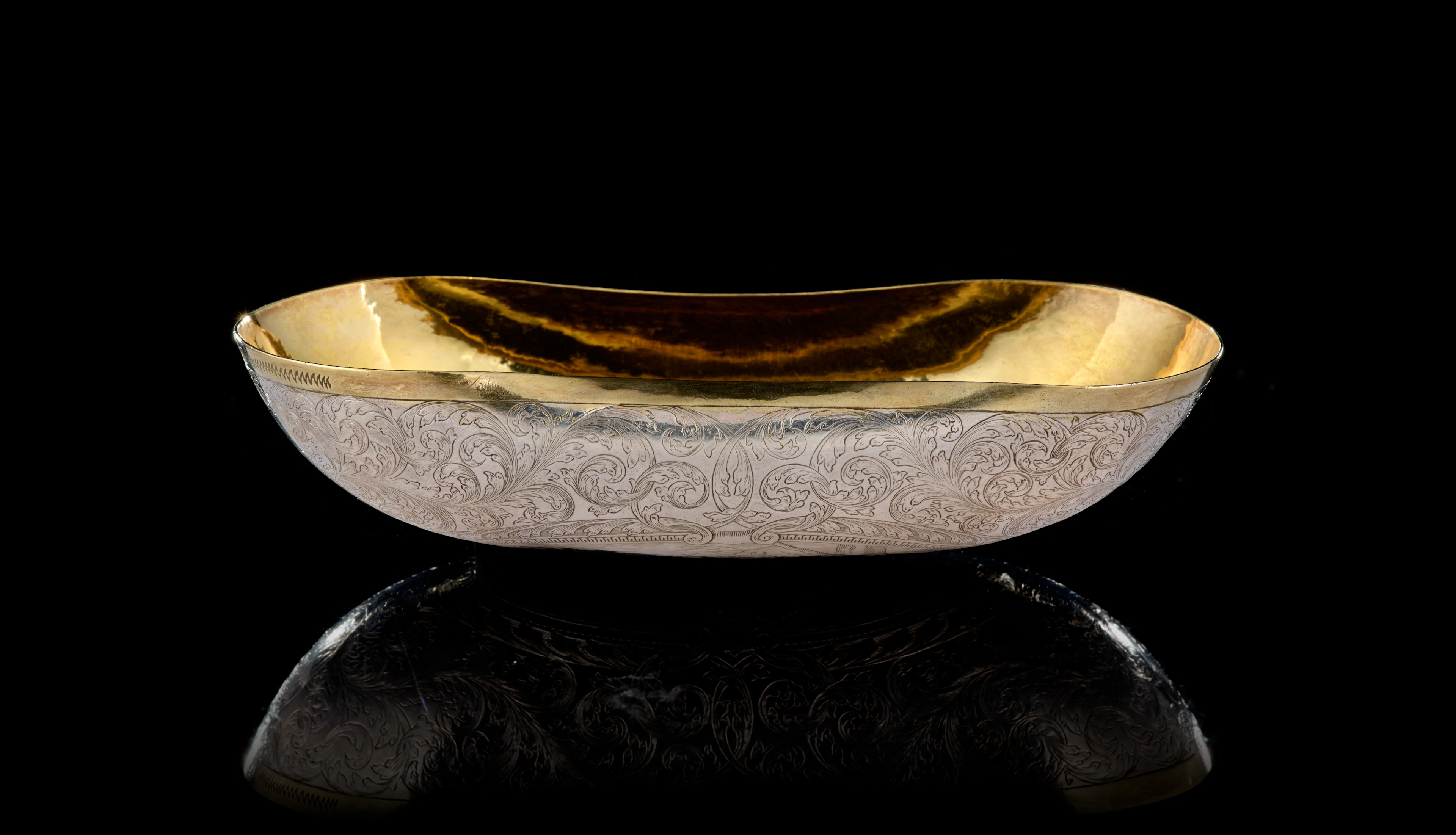 A German parcel-gilt silver hunting cup, Cornelius Poppe, Augsburg, 1685-1687