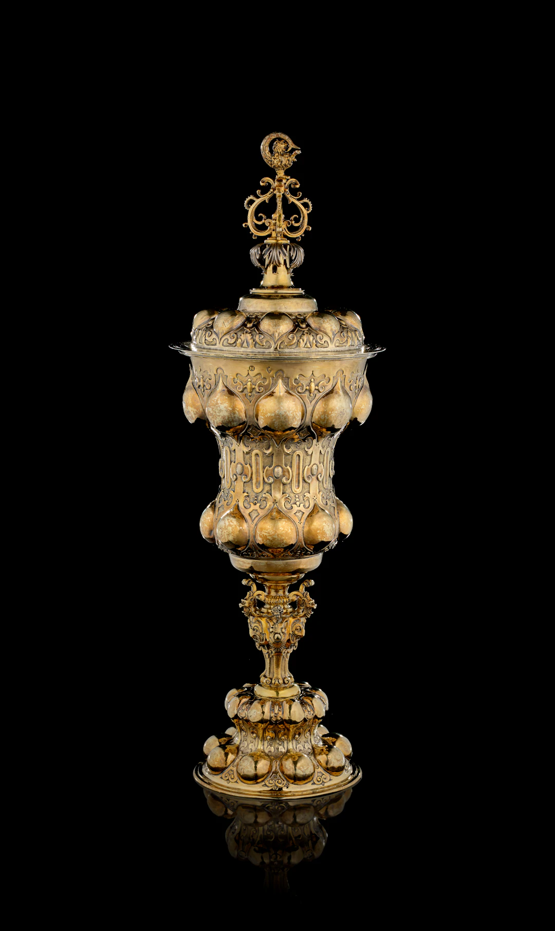 A German parcel-gilt silver covered cup, Hans Pezolt, Nuremberg, 1593-1602