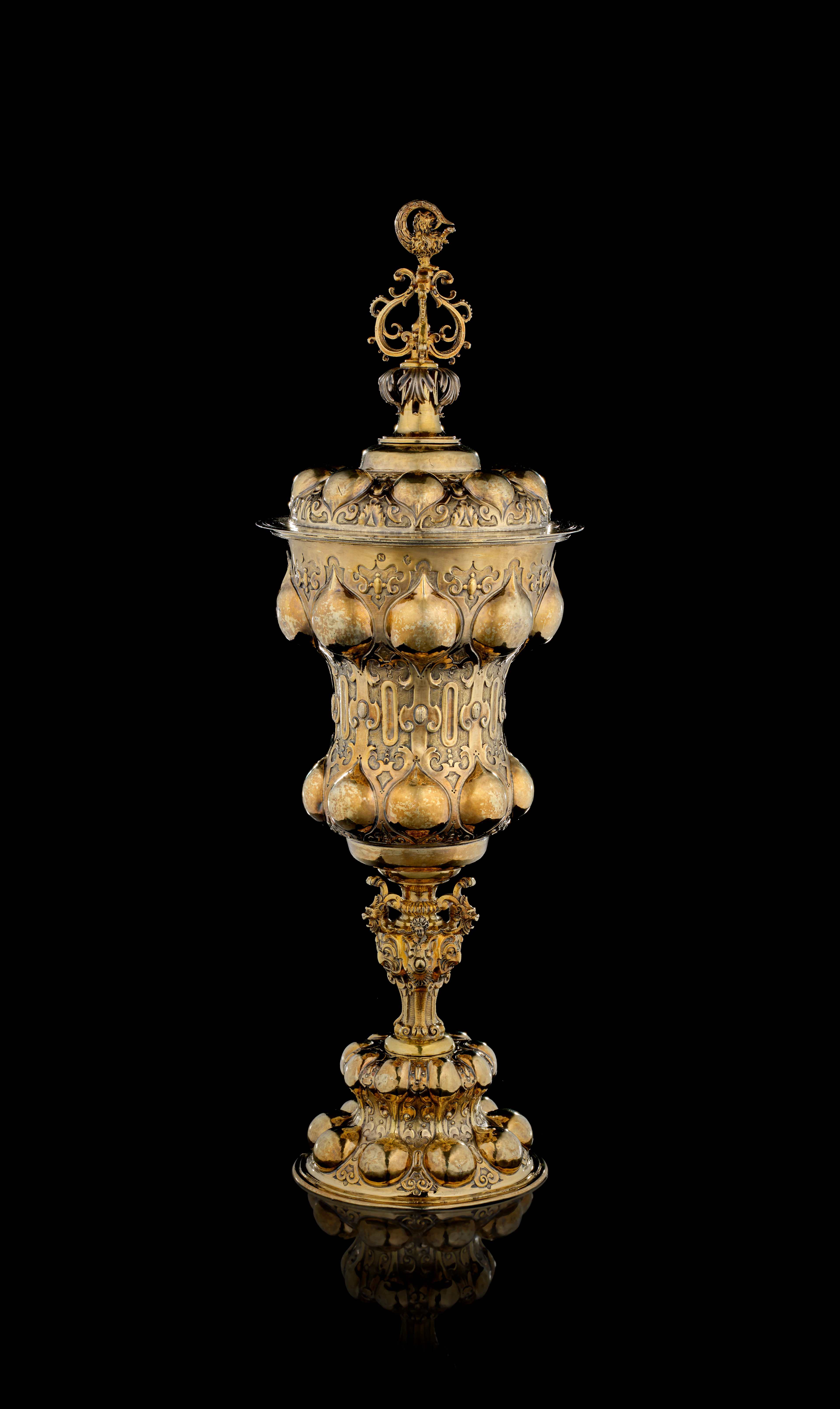 A German parcel-gilt silver covered cup, Hans Pezolt, Nuremberg, 1593-1602