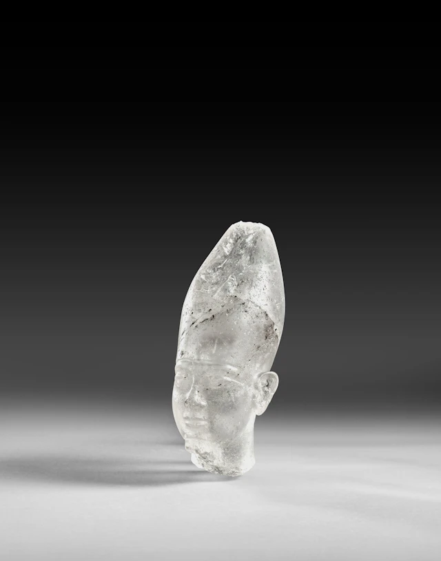 An Egyptian rock crystal royal head