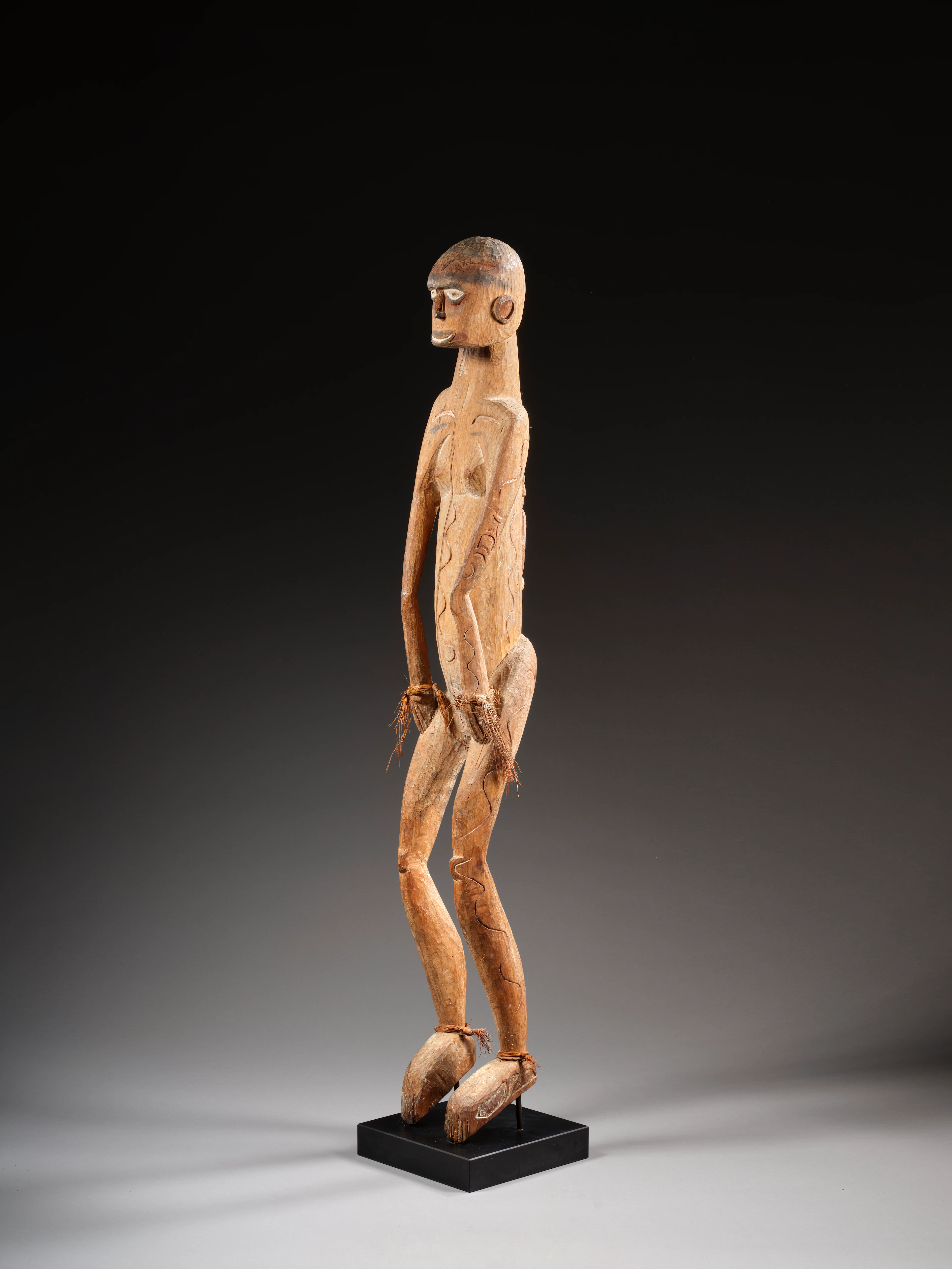 AN ASMAT FIGURE