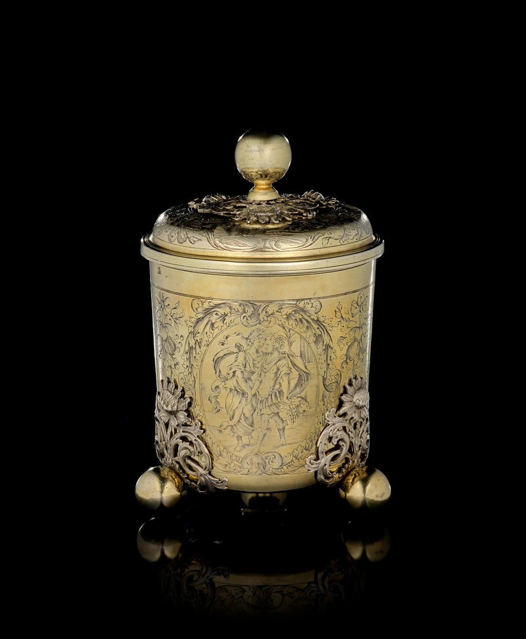 A German parcel-gilt silver covered beaker with enamel medallion