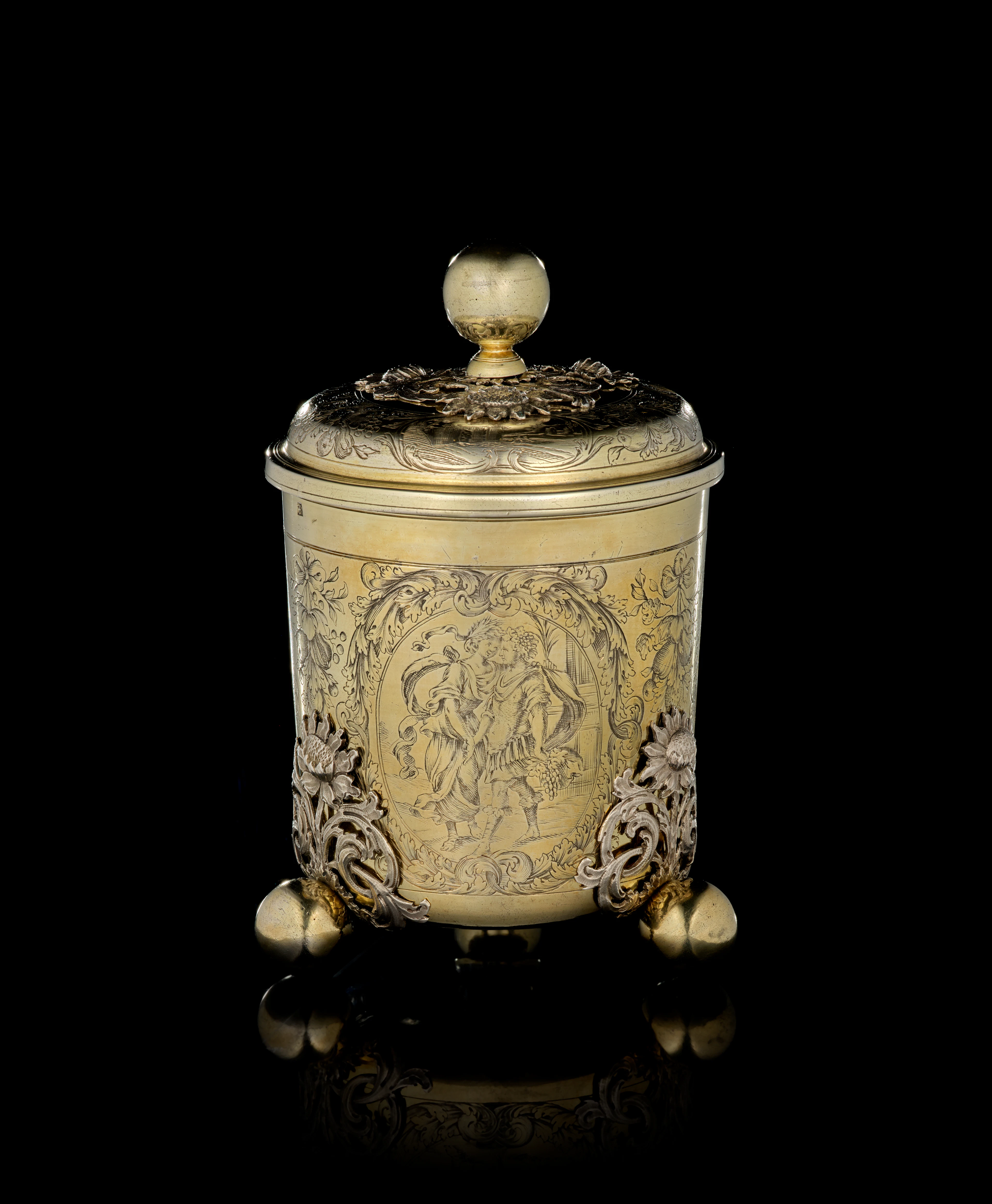 A German parcel-gilt silver covered beaker with enamel medallion