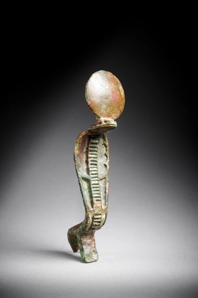 An Egyptian bronze uraeus