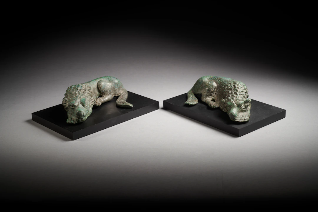A pair of Roman bronze molossian hounds