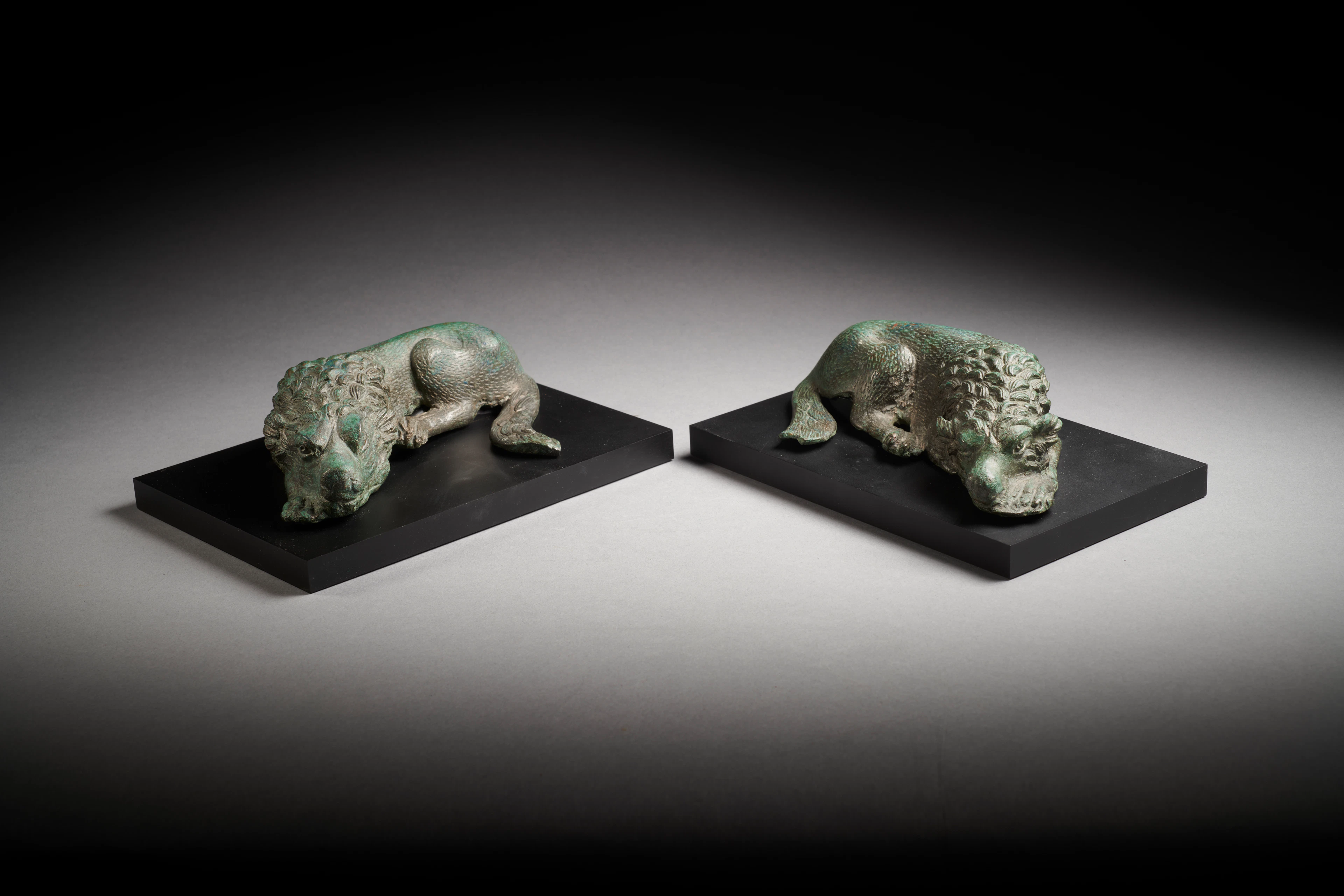 A pair of Roman bronze molossian hounds
