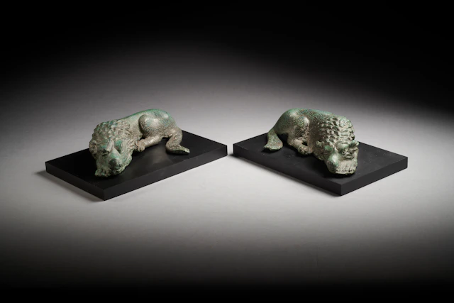 A pair of Roman bronze molossian hounds