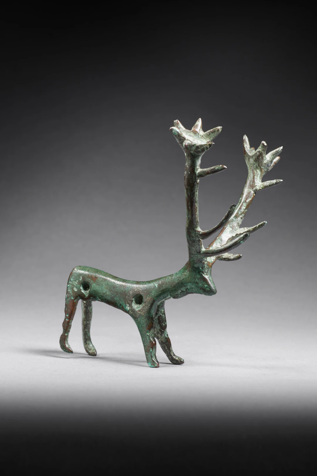An Amlash bronze stag pendant