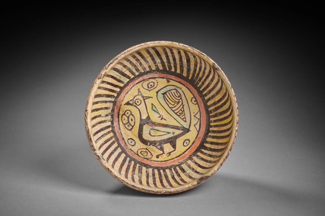 A Nishapur Bowl Decorated with a Peacock