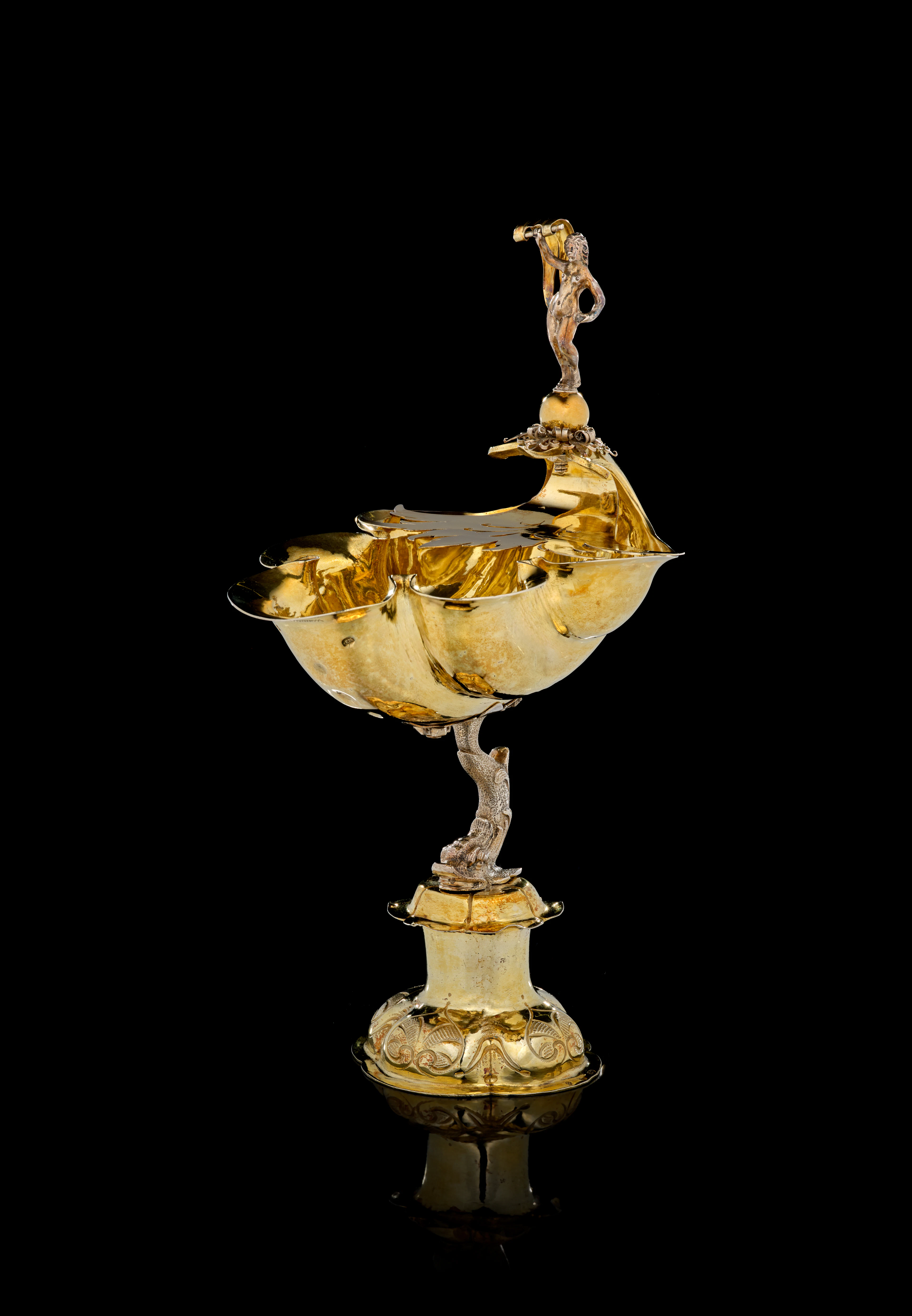 A German parcel-gilt silver shell-shaped cup, Heinrich Roth, Augsbourg