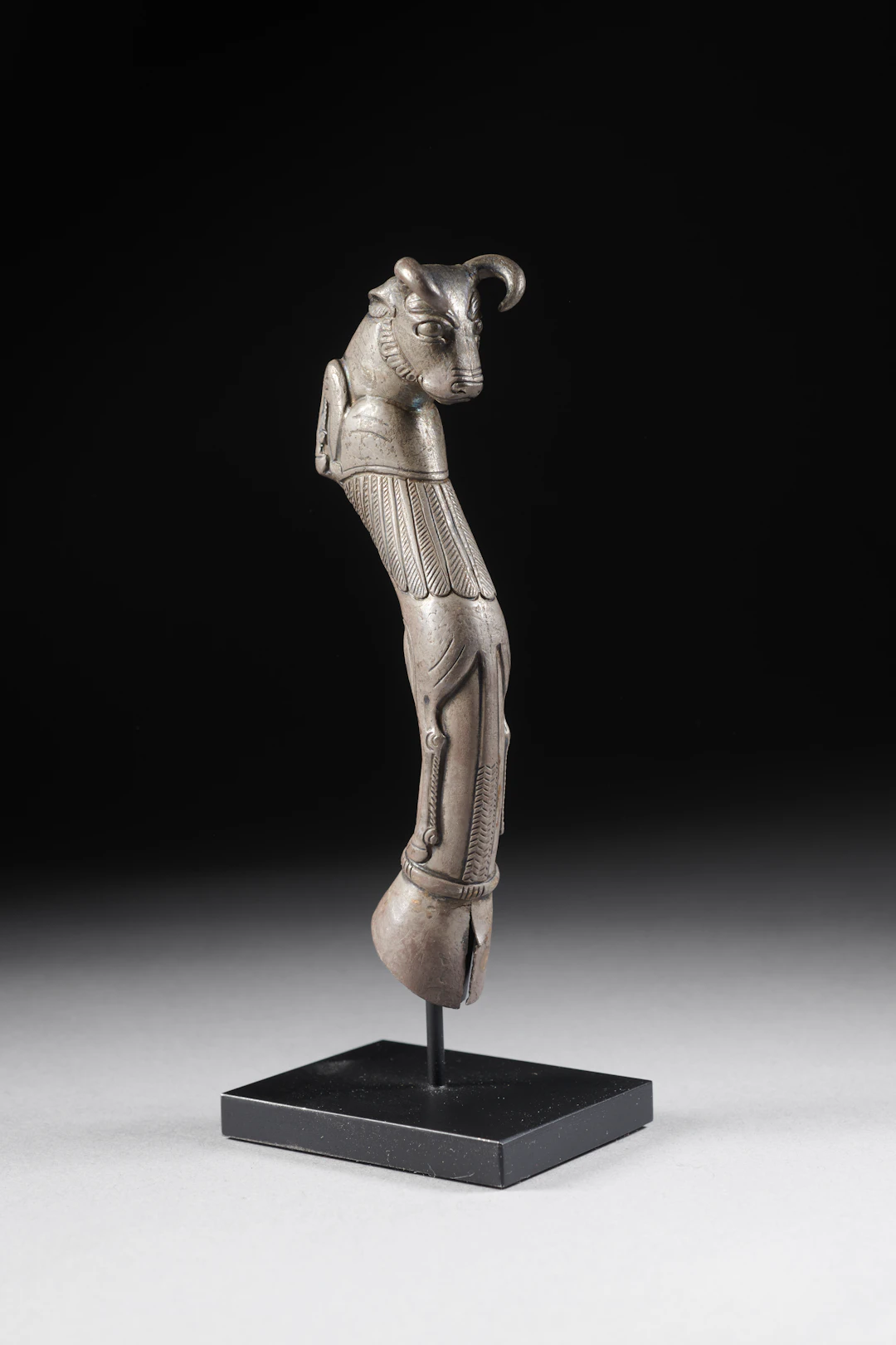 A Silver Achaemenid handle in the form of a winged bull