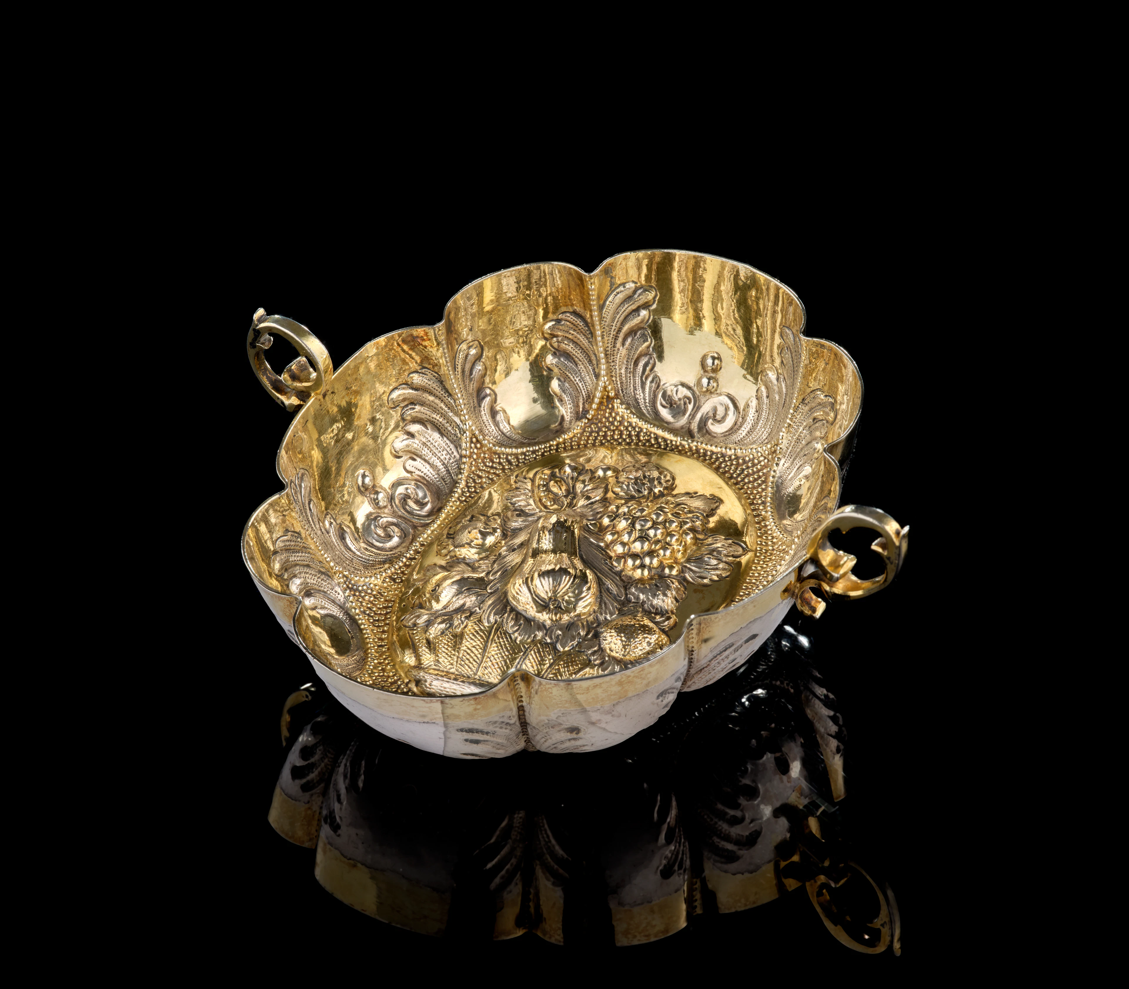 A German parcel-gilt silver wine-taster, Abraham Mair, Augsburg, 1673-1677