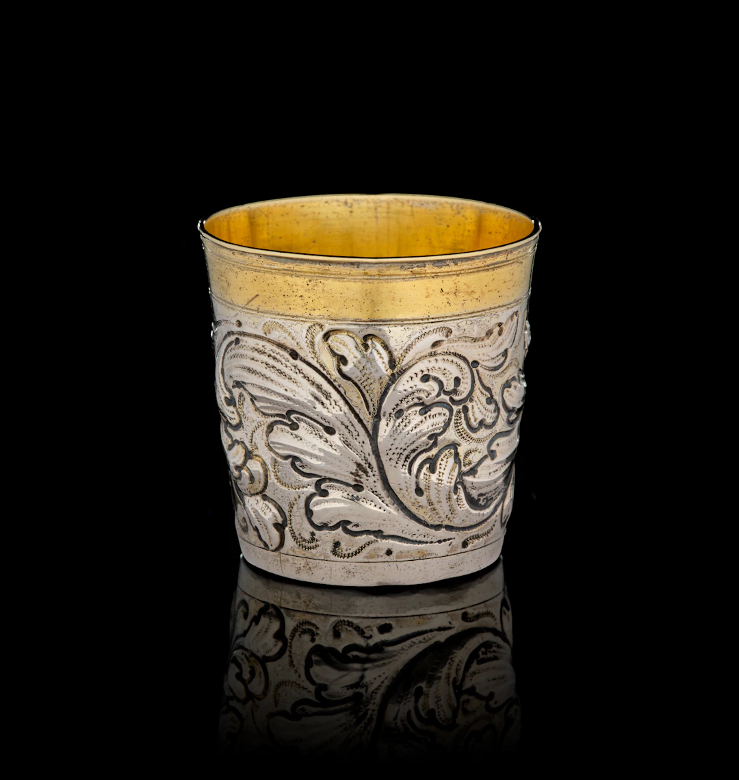 A German parcel-gilt silver beaker with acanthus foliage, Tobias Hallaicher