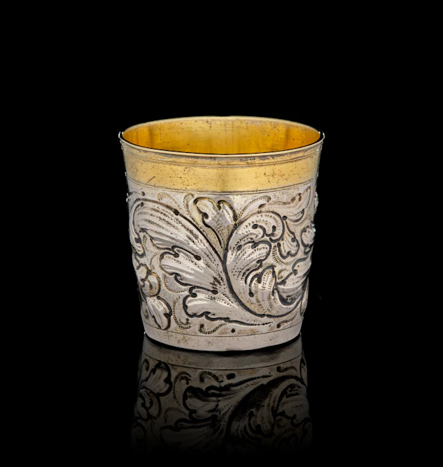 A German parcel-gilt silver beaker with acanthus foliage, Tobias Hallaicher