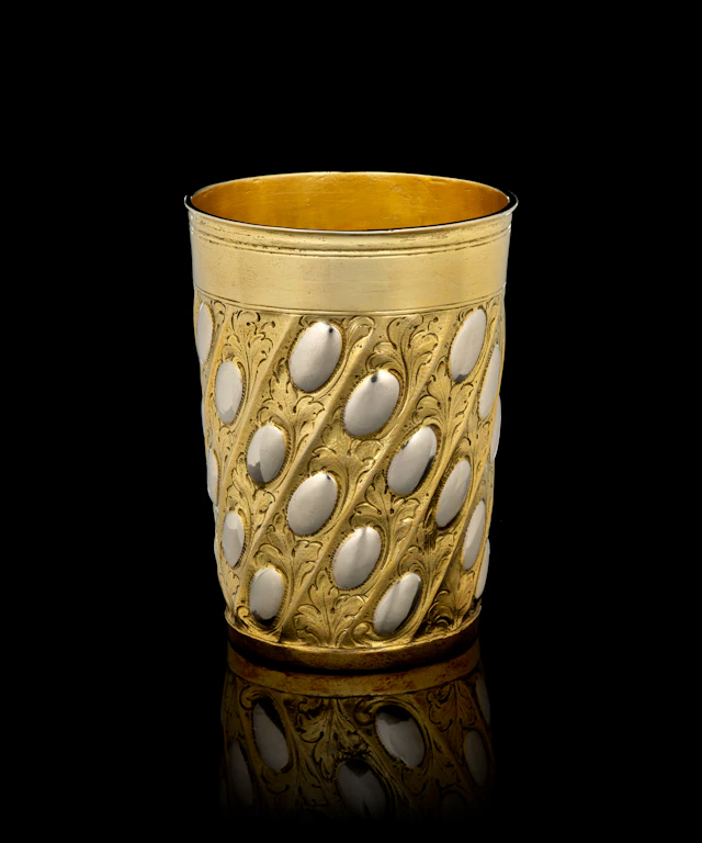 A German parcel-gilt silver beaker with ovolo motifs, Johann Höfler