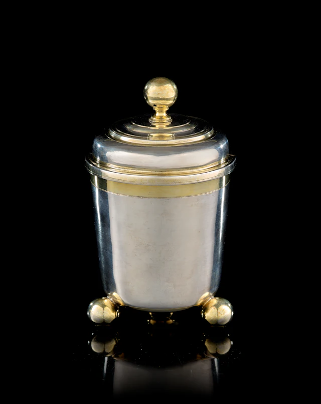A German parcel-gilt silver covered beaker, Ferdinand Schöfeld, Augsburg