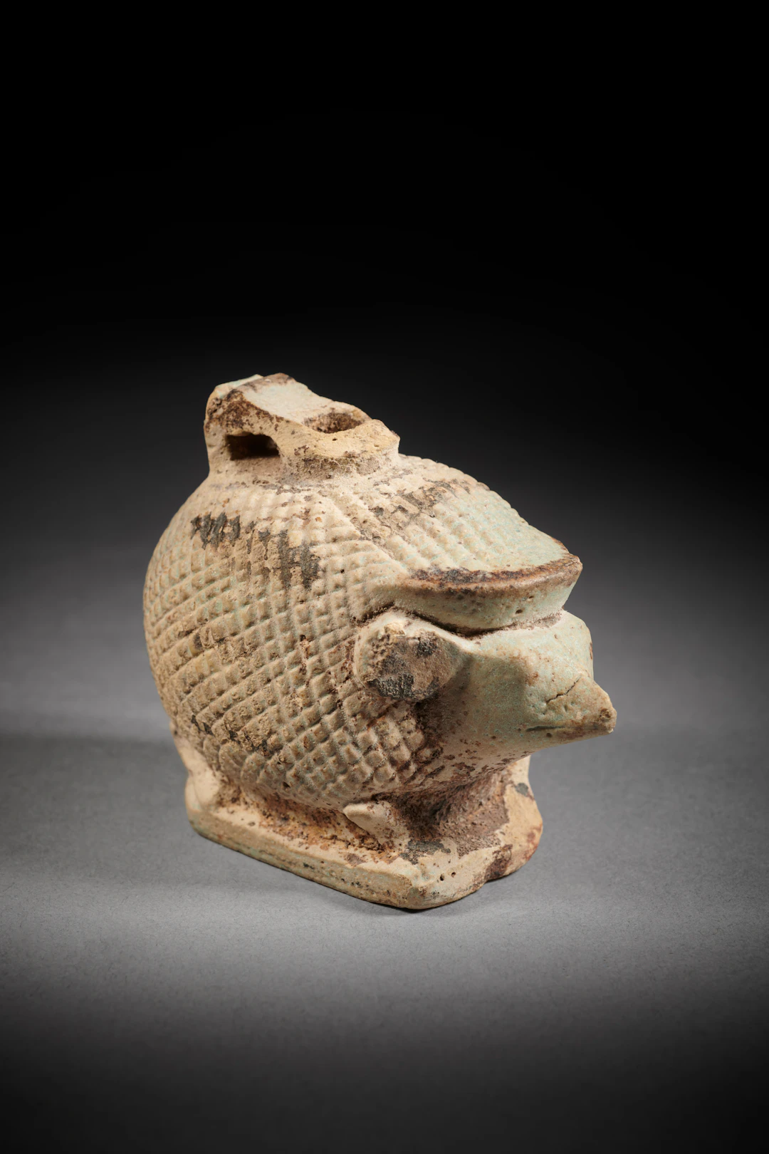 A Graeco-Egyptian faience Hedgehog aryballos