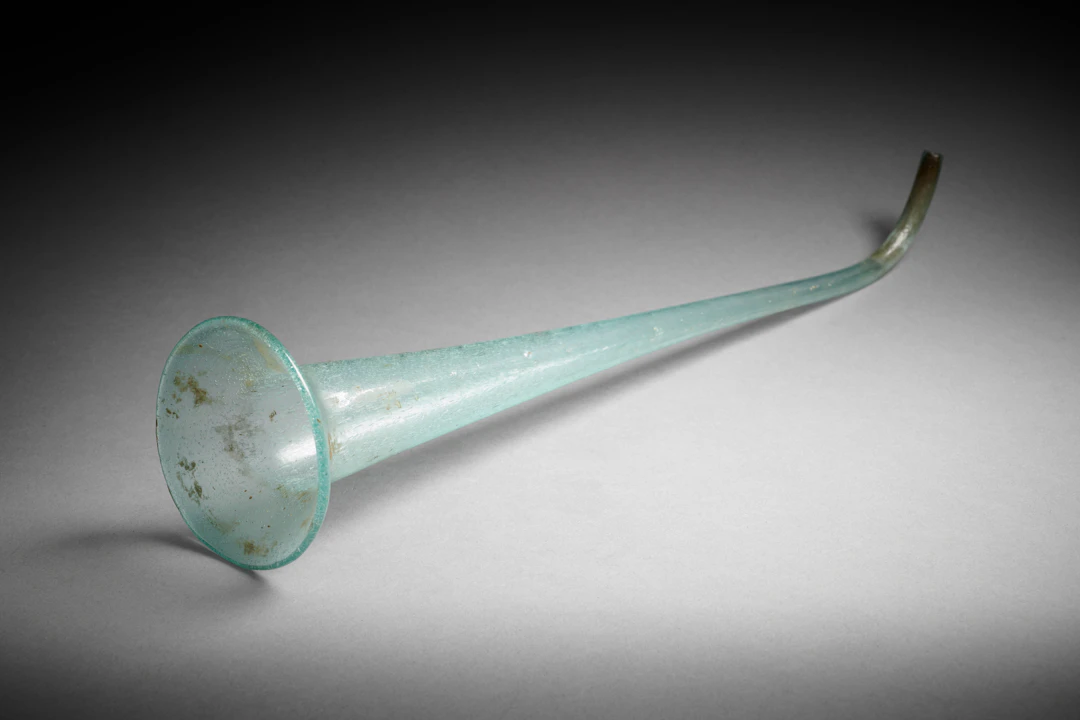 A Roman glass funnel