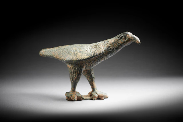 A Roman bronze statuette of a raven