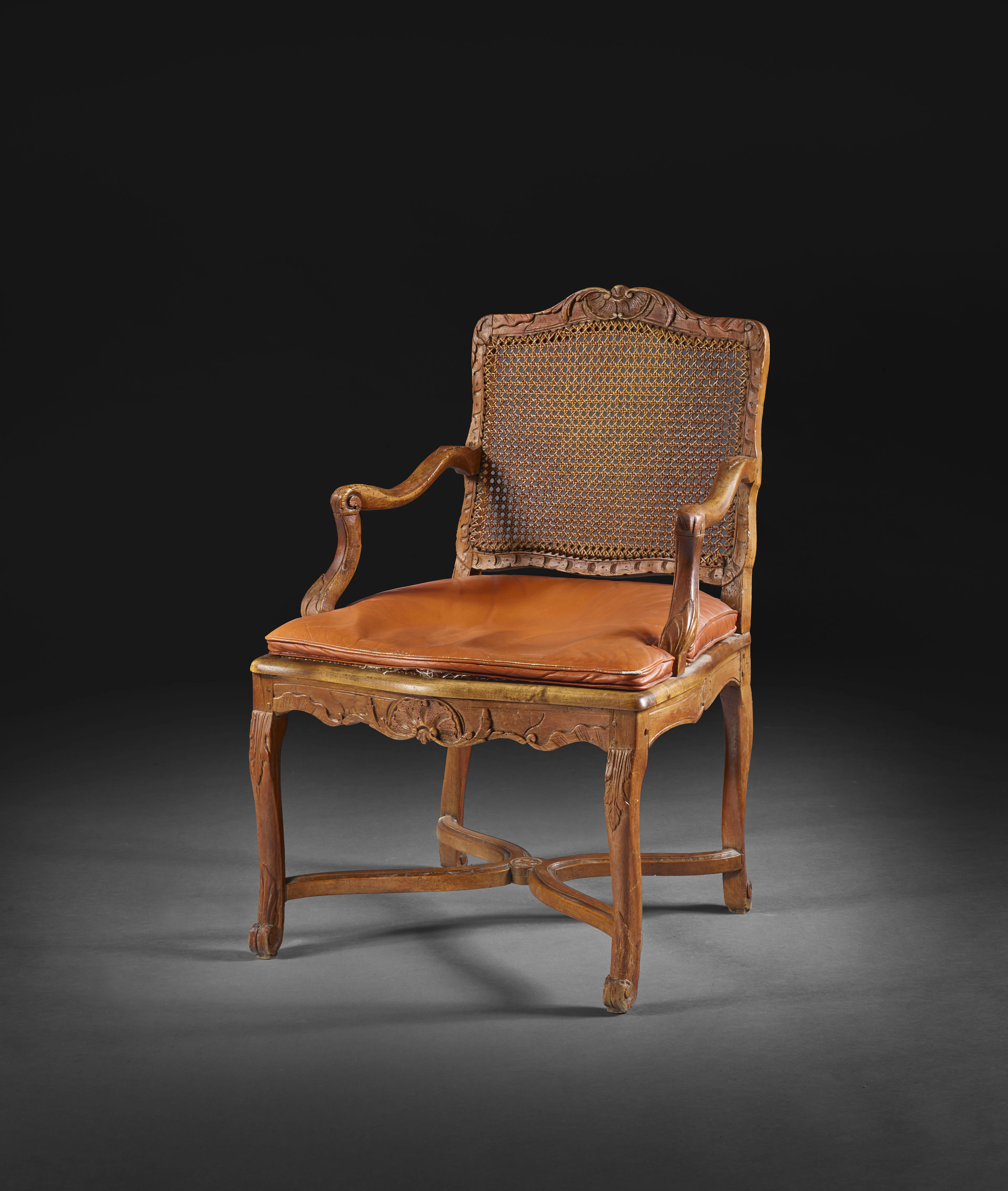 FAUTEUIL CANNÉ D'ÉPOQUE RÉGENCE