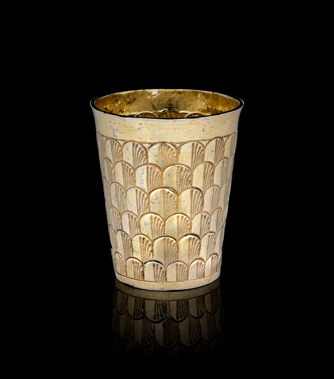 A Swiss silver-gilt beaker with peacock feathers motifs, Hans Heinrich