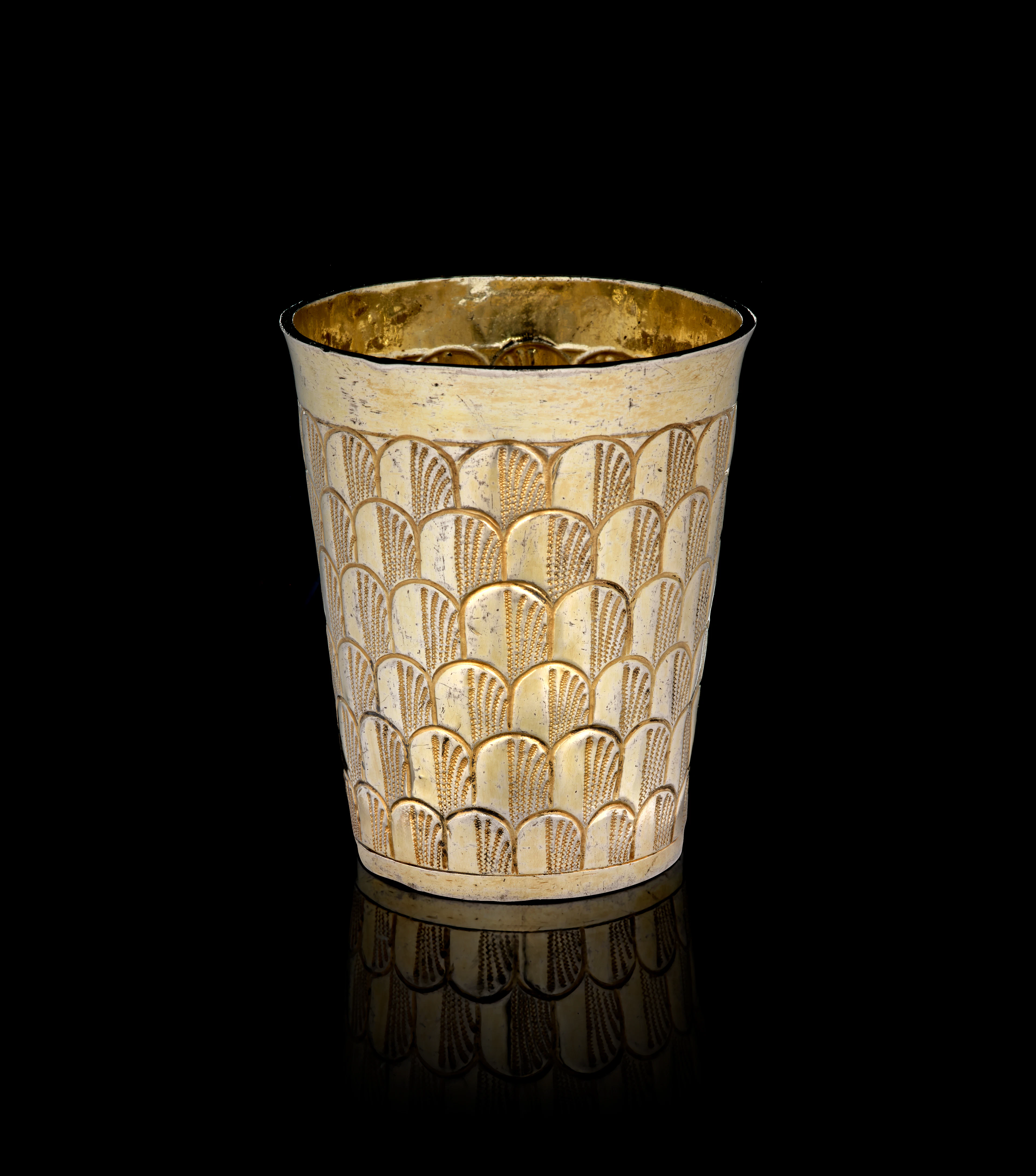 A Swiss silver-gilt beaker with peacock feathers motifs, Hans Heinrich