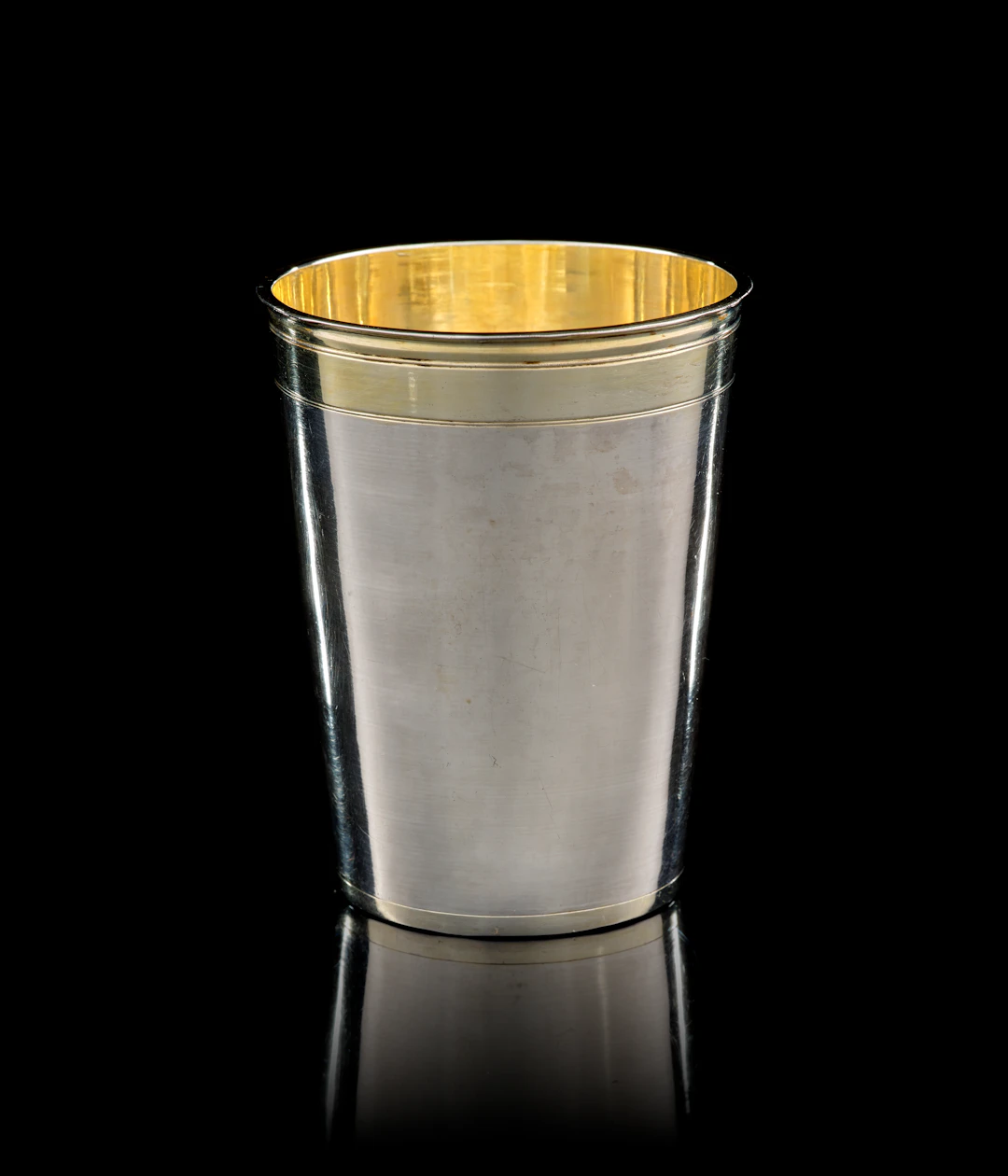 A German parcel-gilt silver beaker, Johannes I. Treffler, Augsburg, 1720-1723