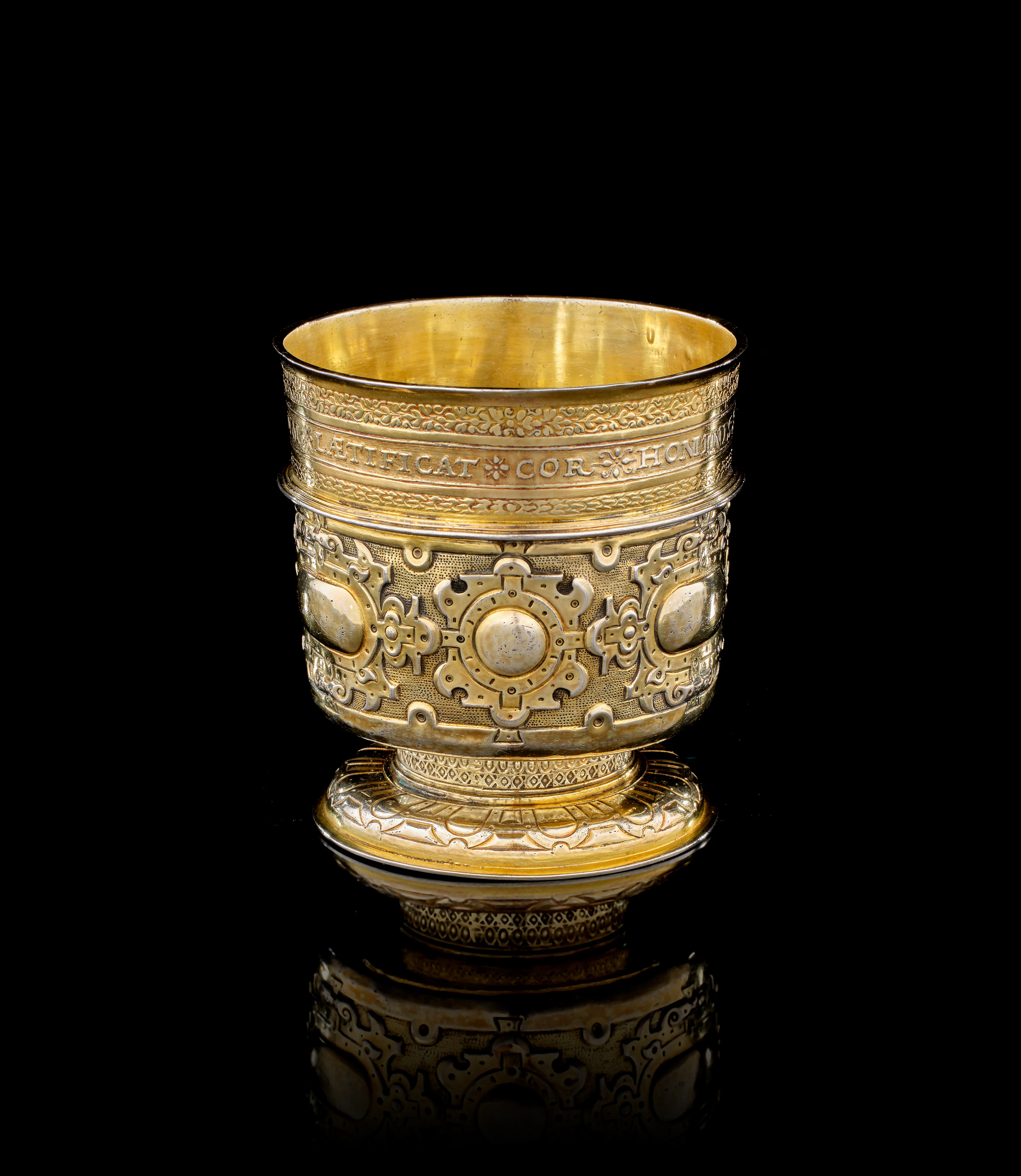 A German silver-gilt coin beaker, Arnold Schmidt, Nuremberg, 1571