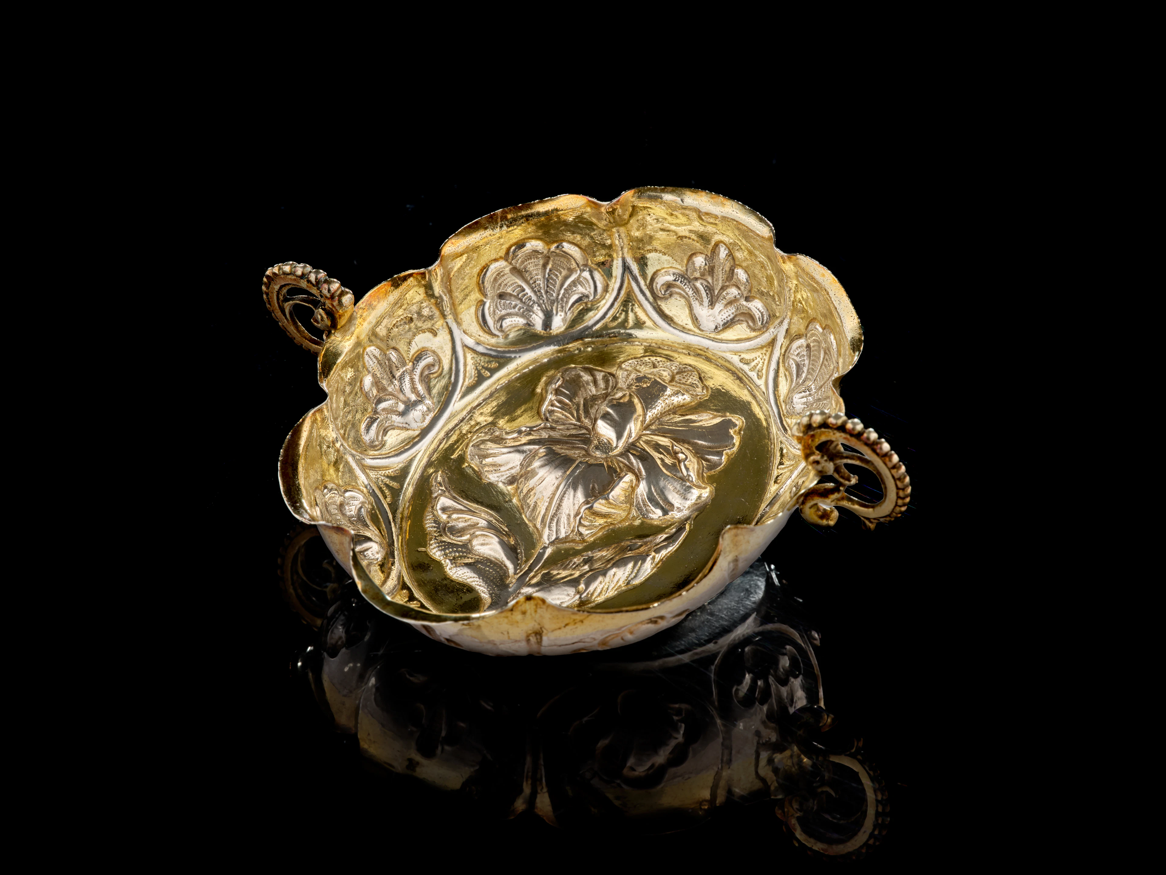 A German parcel-gilt silver wine-taster, Paul Solanier, Augsburg, 1705-1709