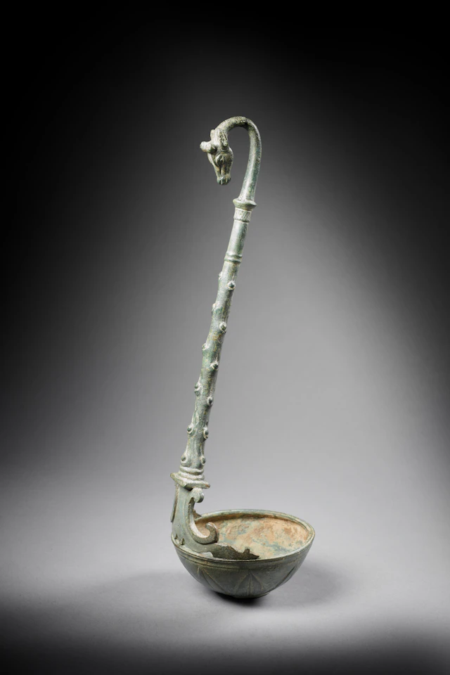 A Roman bronze "simpulum" ladle