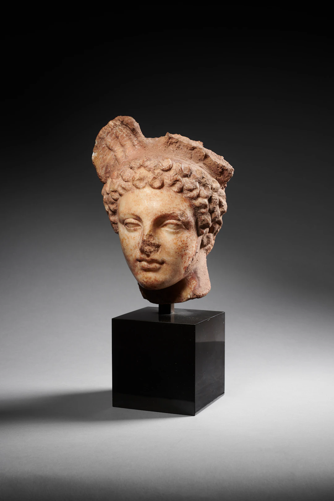 A Roman marble head of Mercury