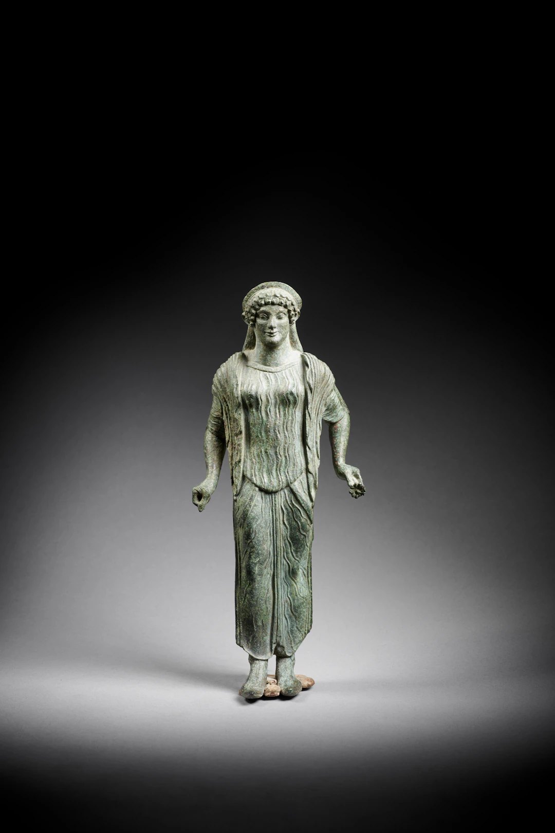 An Etruscan bronze kore