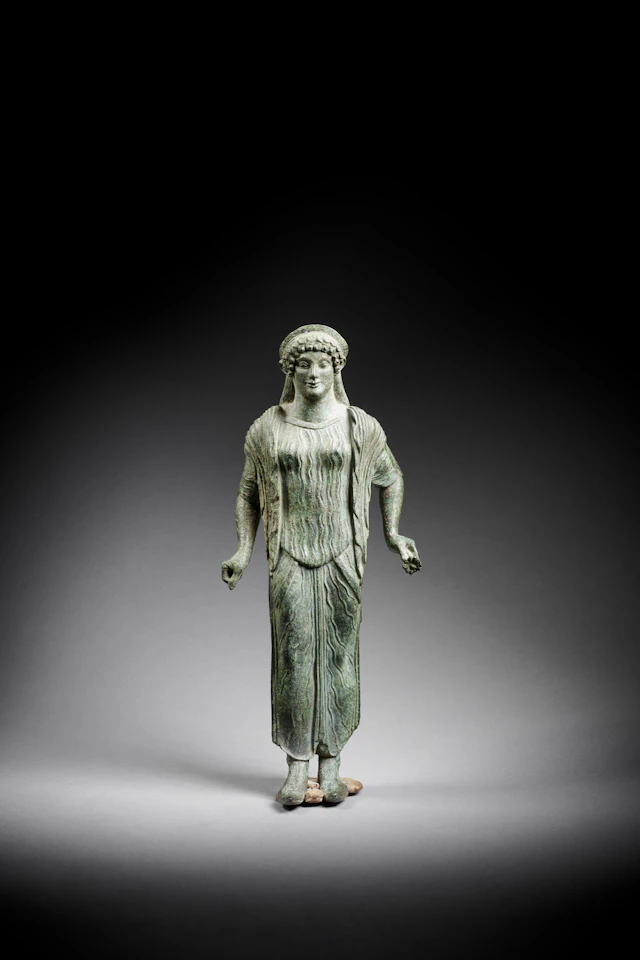 An Etruscan bronze kore