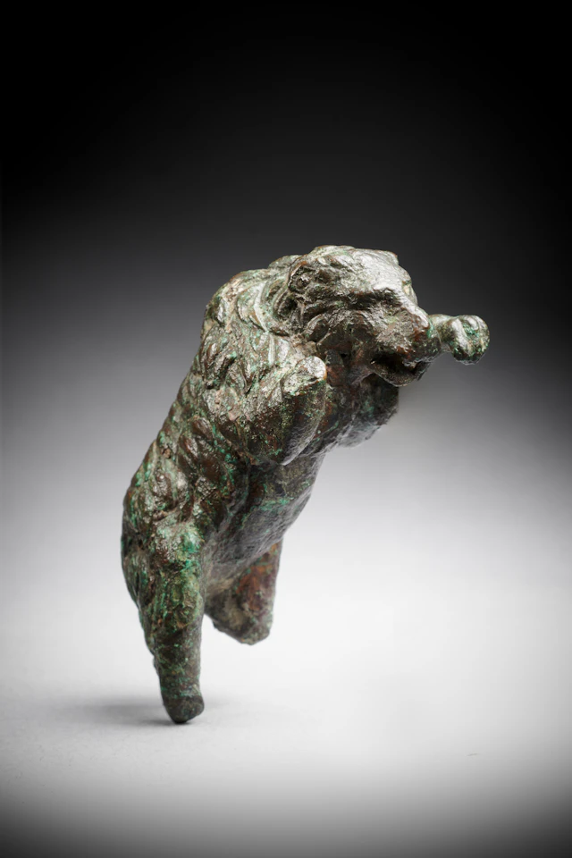A Roman bronze statuette of a leaping bear, circa 2nd century A.D.