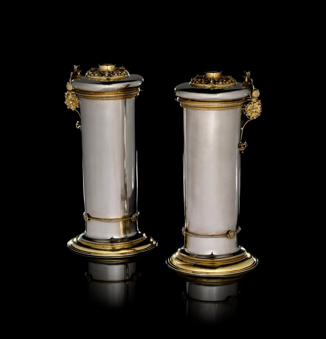 A Latvian pair of parcel-gilt silver tankards, Matthias Rolowes, Riga