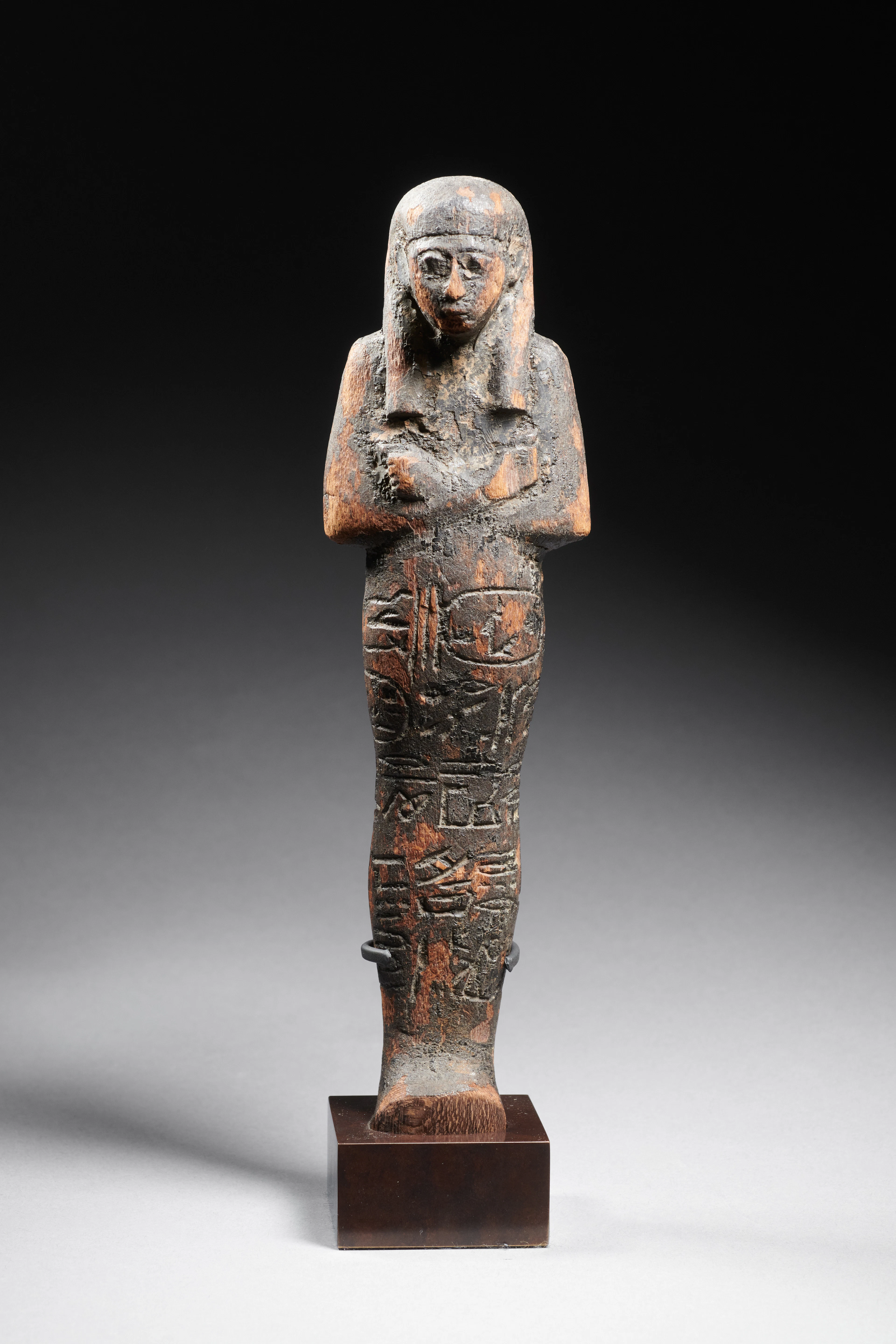 An Egyptian wood shabti for Sety I