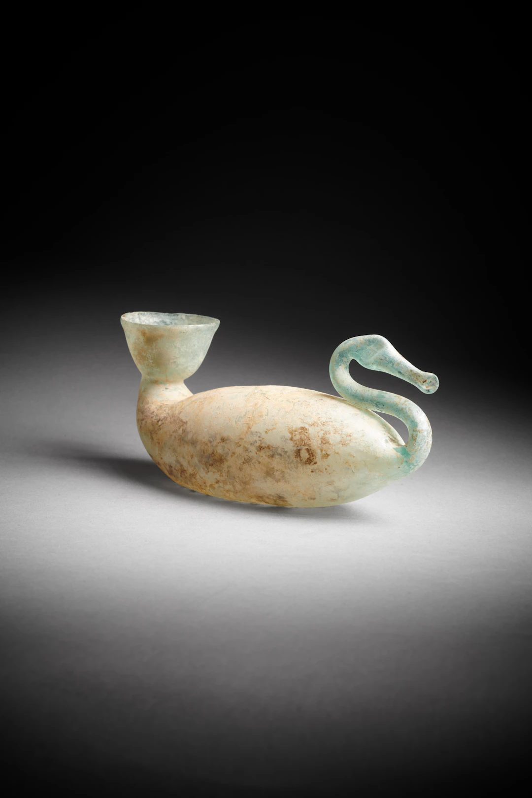 A Roman glass swan-shaped askos