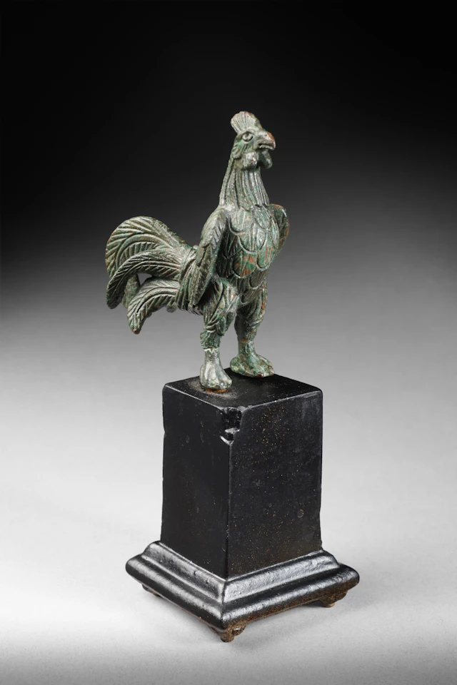 A Roman bronze standing cockerel