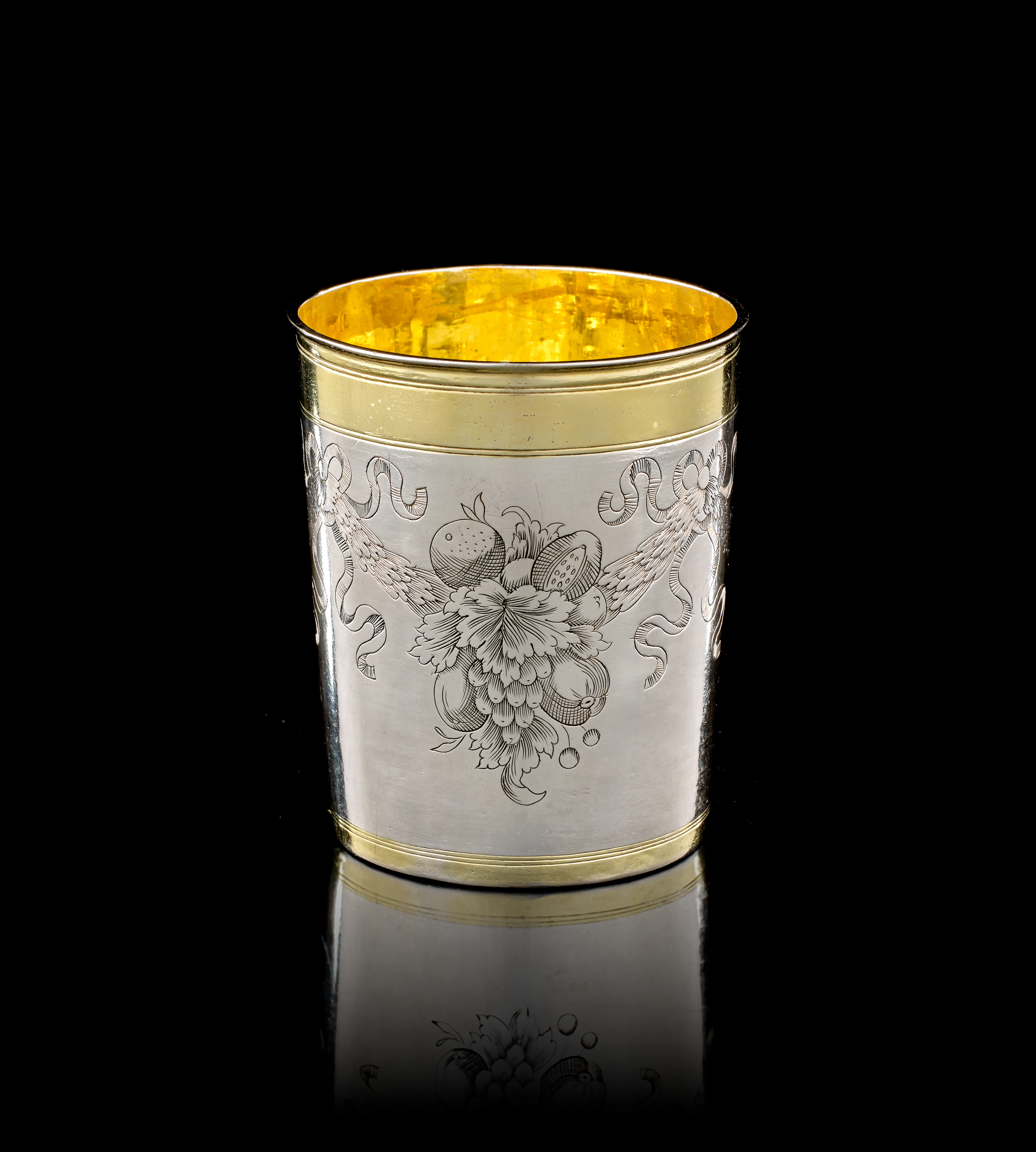A German parcel-gilt silver beaker, Jacob Pfaff, Nuremberg, 1705-1706