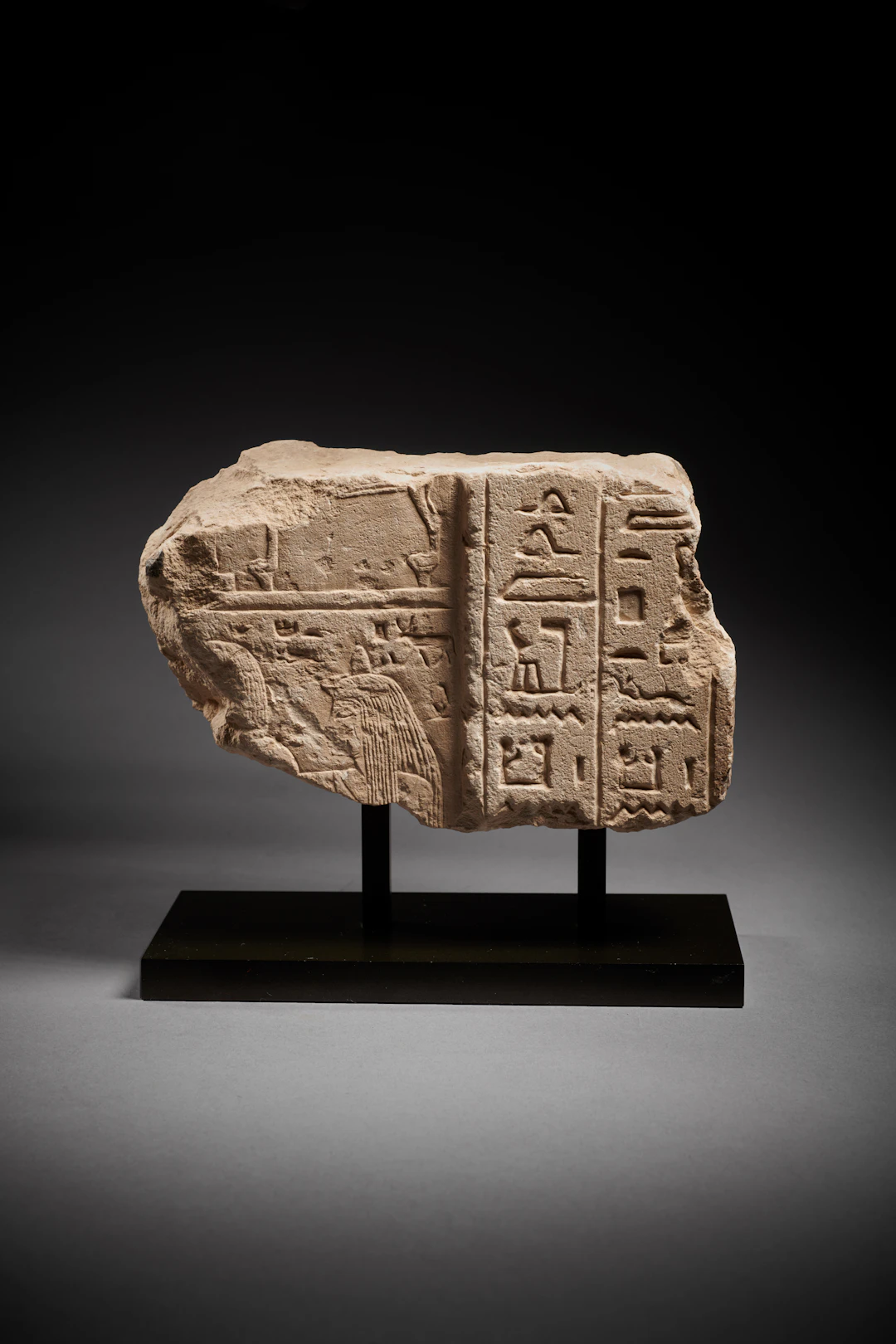 A fragmentary Egyptian limestone funerary stele