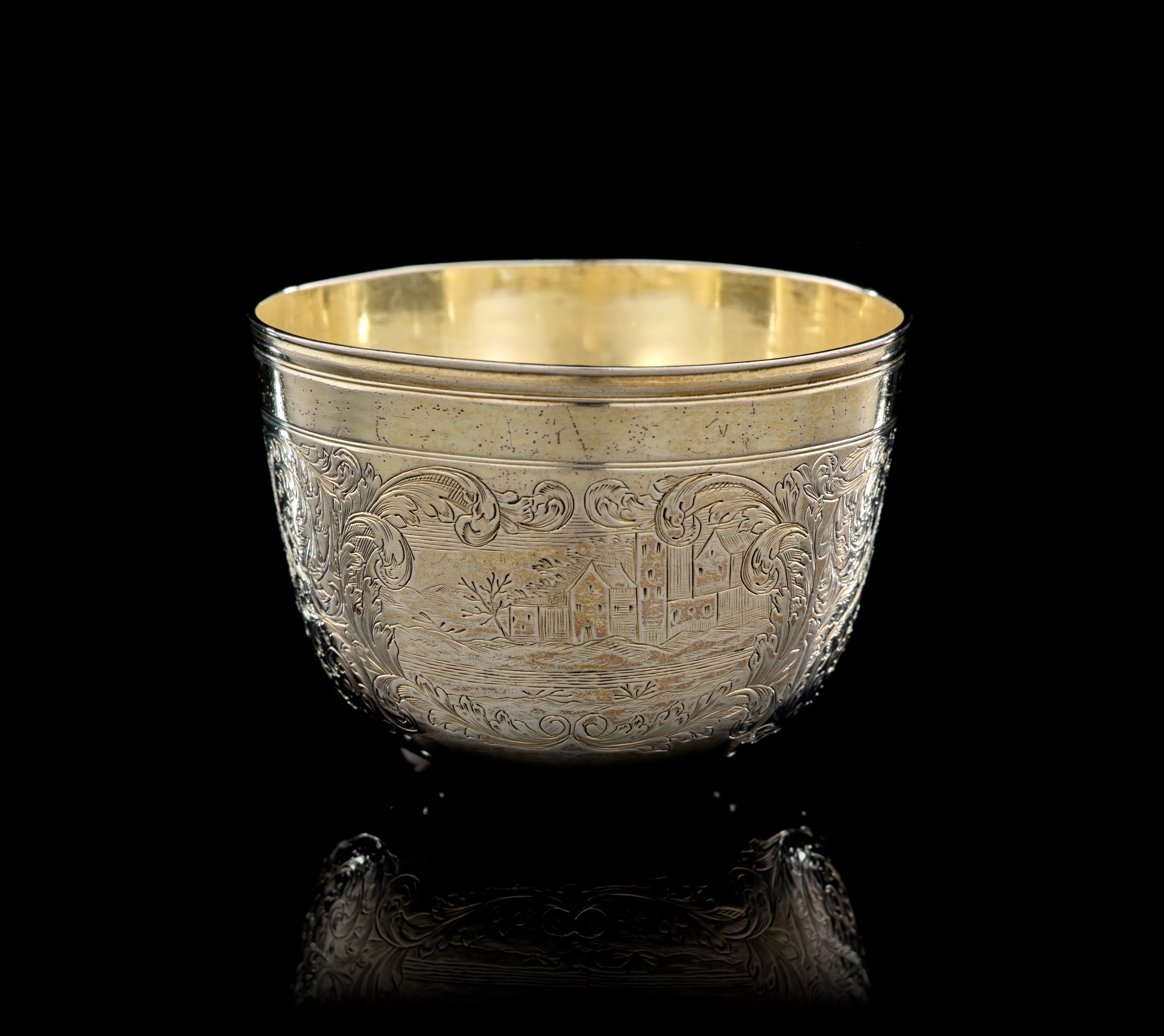 A German parcel-gilt silver tumbler beaker, Paul Solanier, Augsburg, 1701-1705