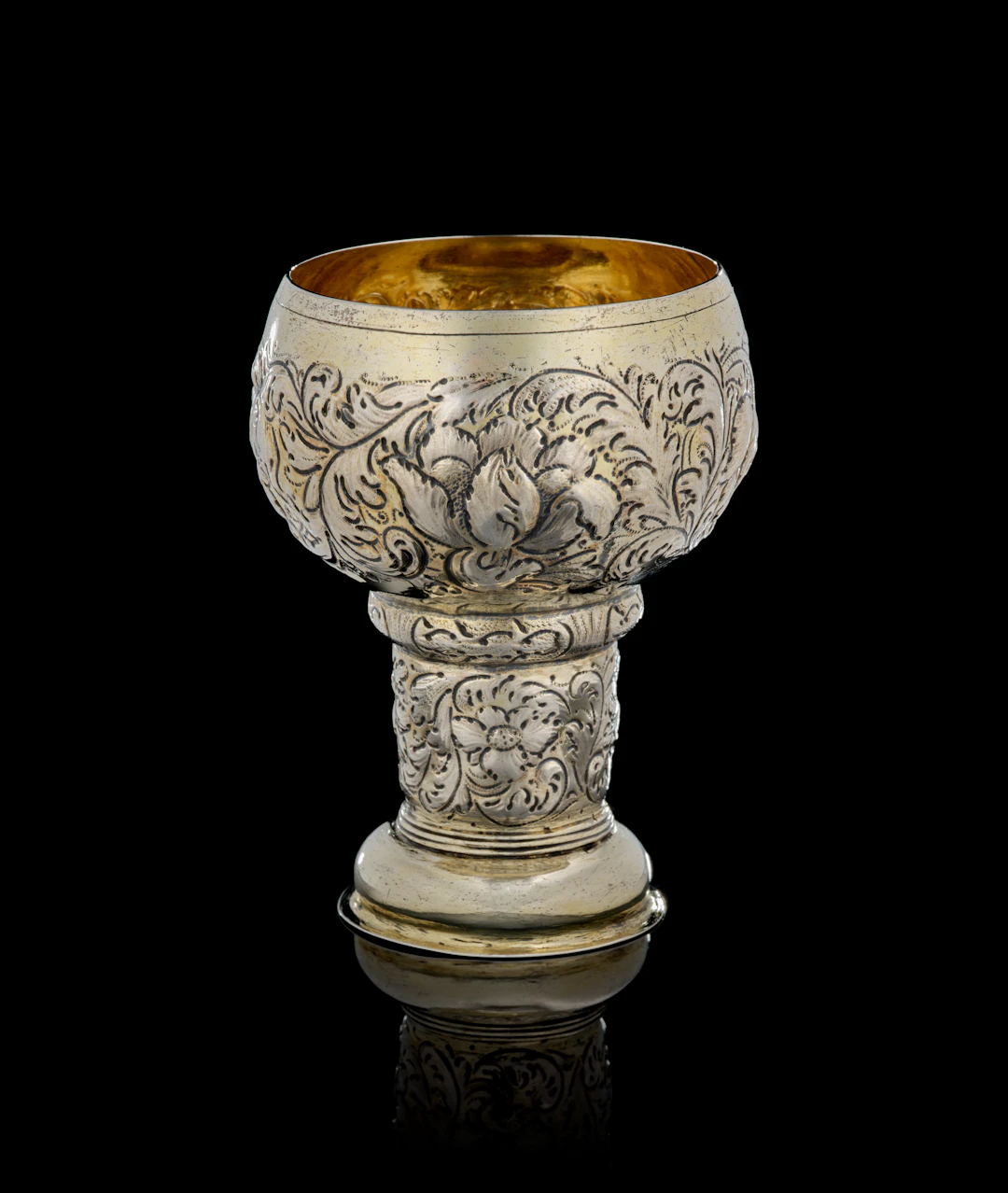 A large German parcel-gilt silver römer beaker, Reinhold Rühl, Nuremberg, 1680