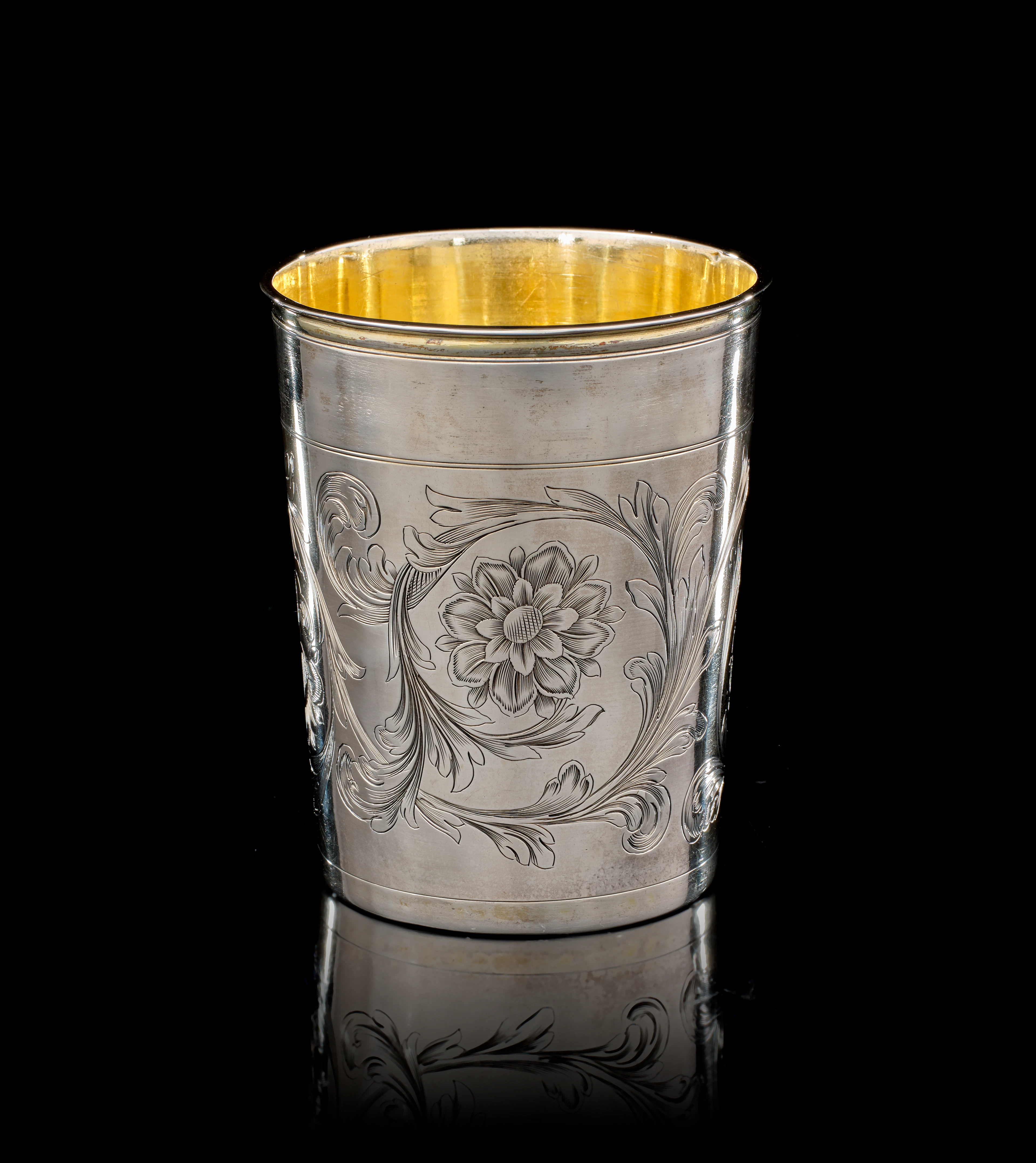 A German parcel-gilt silver beaker, Cornelius Poppe, Augsburg, 1689-1692
