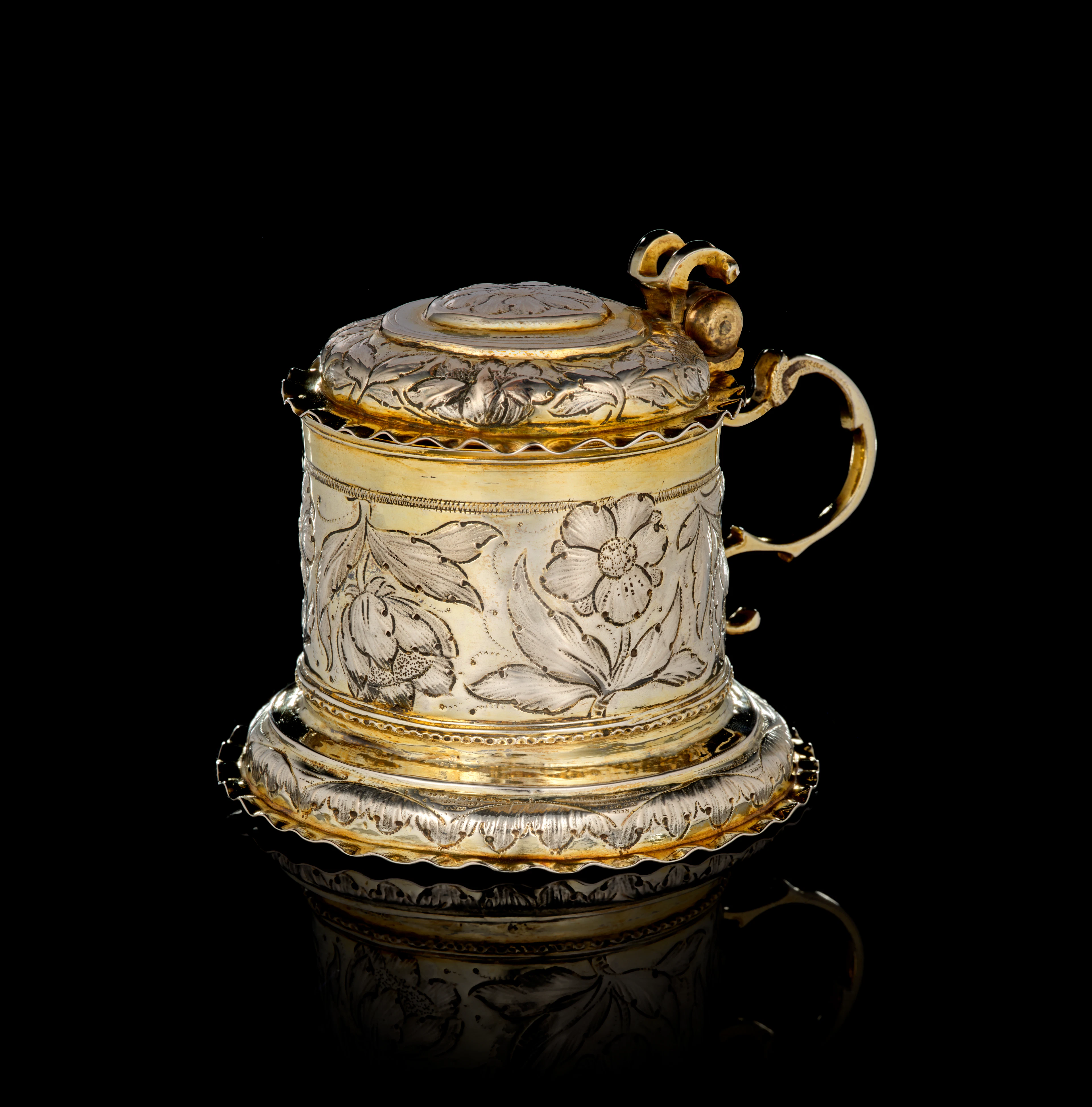 A small German parcel-gilt silver covered tankard (lady tankard)