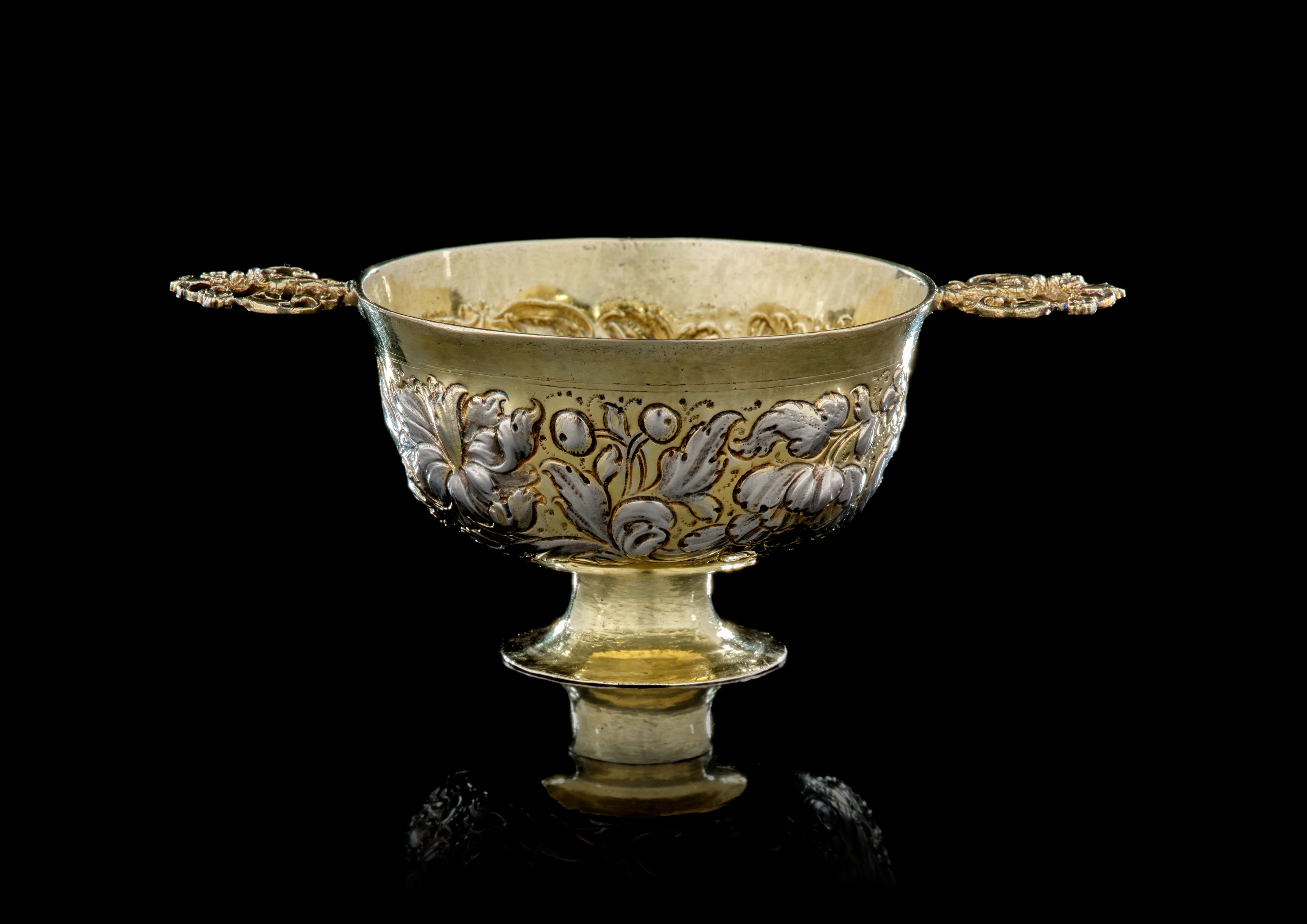 A small German parcel-gilt silver cup with two handles, Andreas Berckmann